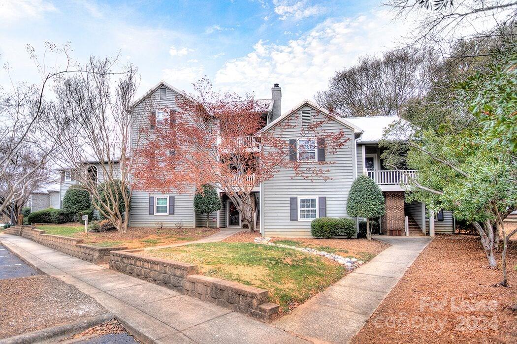 Wonderful second story condo in the heart of Sedgefield convenient to everything!  Updated Condo with newer  flooring and granite countertops.  Open floor plan includes vaulted ceilings in living, wood burning fireplace, large bedrooms with walk-in closet, & huge private balcony.   Separate laundry room offers generous storage space; washer and dryer included. Community includes pool and convenient ample parking.