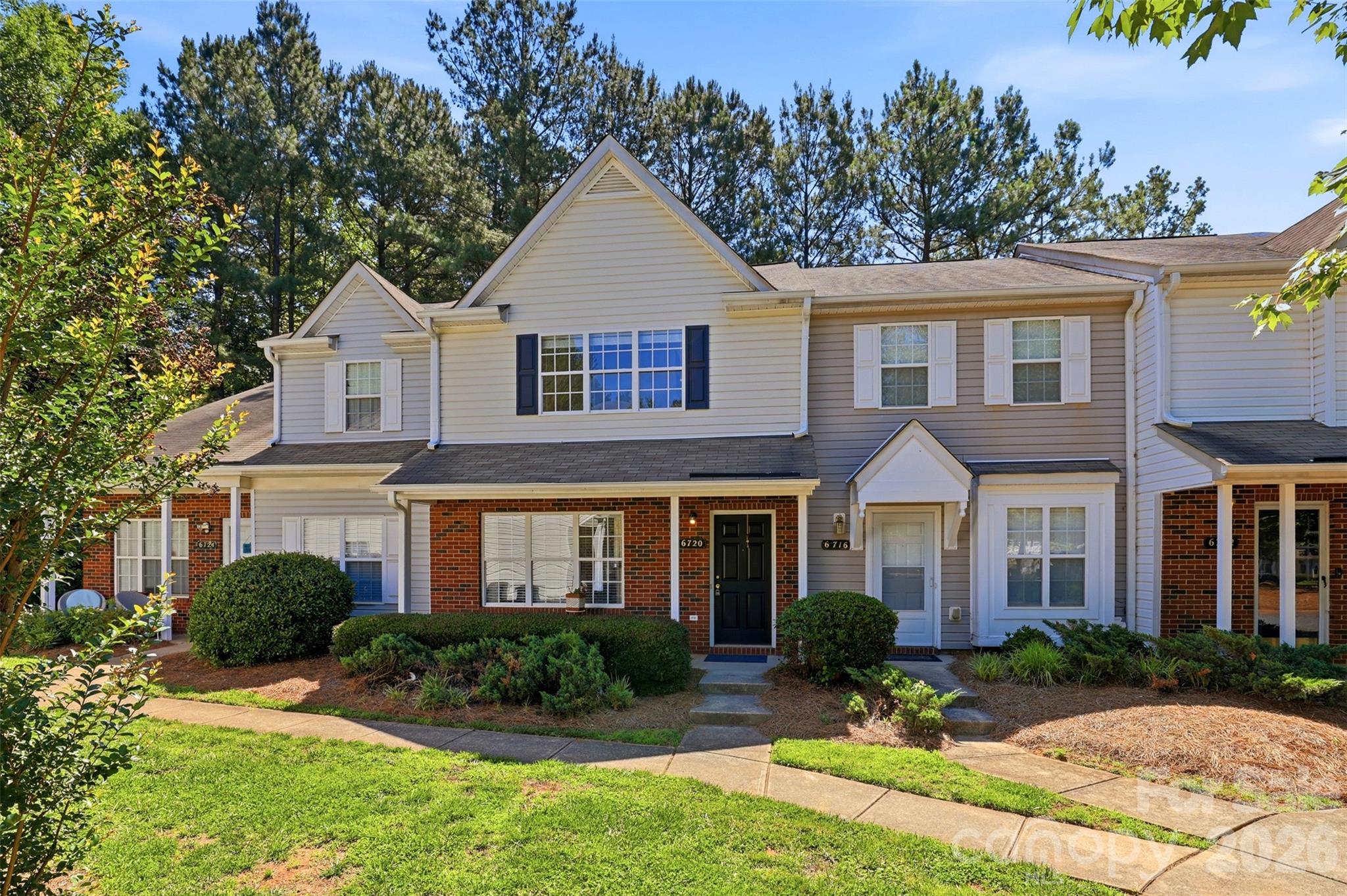 Move-In Ready Charlotte Townhome with 2 Primary Suites and Low-Maintenance Living.

Freshly painted throughout the first floor and featuring professionally cleaned carpets, this well-maintained two-bedroom, two-and-a-half-bath townhome is ready for its next owner. The main level offers an inviting living and dining area, a spacious kitchen, and a convenient laundry room, creating a functional layout ideal for both everyday living and entertaining.

Upstairs, you'll find two generously sized bedrooms, each with access to its own full bathroom, providing privacy and flexibility for homeowners, guests, or roommates. A convenient half bath on the main level adds to the home's practical design.

Enjoy your morning coffee on the welcoming front porch or relax on the private patio. Assigned parking and HOA-maintained exterior spaces make ownership simple and stress-free.

Located in the established Kimmerly Woods community, this home offers easy access to Uptown Charlotte, University City, I-485, I-85, shopping, dining, parks, and everyday conveniences. Whether you're a first-time homebuyer, downsizing, or searching for an investment opportunity, this property delivers exceptional value in one of Charlotte's most convenient locations.

With fresh paint, cleaned carpets, low-maintenance living, and an affordable price point, 6720 Cypress Tree Lane is ready to welcome you home.