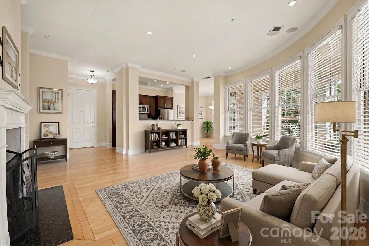 ***$5,000 Lender Credit when you get approved with participating lender*** The seller is paying the assessment that includes exterior renovations including exterior cladding, roof drainage system design/repair, replacement of windows/doors, and refurbishment of balconies.*** Welcome to Southgate on Fairview Condos - just minutes from the heart of Southpark, shopping, restaurants, entertainment, Park Road Park, and the rest of everything the beautiful Queen City has to offer. This is your chance to own one of the larger condos in Fairview. The building features secure entry level access, a parking garage with two parking spaces, storage, an available social room, elevator access to the 2nd floor, and a peaceful walk to the end unit. The 3 bedrooms, 2.5 bathroom condo is move-in ready and features high ceilings, light hardwood floors, recessed lighting, and tons of desirable natural lighting. The galley kitchen features granite countertops, tile backsplash, stainless appliances, wooden cabinetry, bar seating, and access to the formal dining area. The spacious living room is surrounded by beautiful bay-like windows and houses the fireplaces, mantle, and TV. The split floor plan has the two secondary bedrooms and spacious closet on one side separated by the jack and jill bathroom, while the primary suite, bathroom and walk-in closet are on the other side. That's not all!! Finally, the key focal point of the Condo is the huge walk out terrace perfect for entertaining, relaxing, catching a glimpse of the moon and stars! We welcome you to take a tour today!