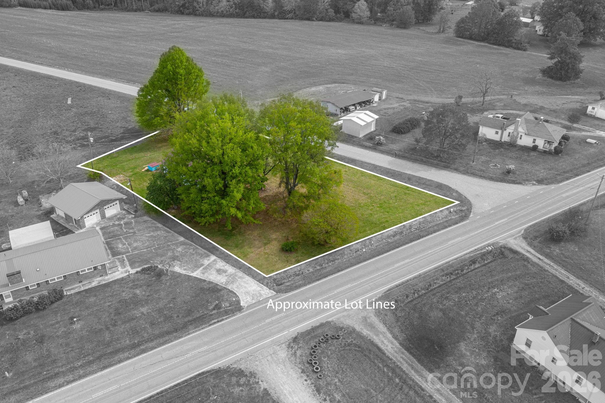 Rare opportunity to secure a prime homesite with endless potential! Situated on a beautiful ¾-acre corner lot, this property offers the perfect setting for your next project—whether you choose to fully renovate the existing 1930s home or start fresh with a brand-new build. The current structure is in need of repair and is being sold as-is, making it ideal for investors, builders, or buyers looking for a project. With well and power service already in place, the ground work is already laid for your future plans. The spacious corner lot provides excellent layout flexibility and curb appeal, making it a standout option for a future spec home or primary residence. Don’t miss your chance to transform this property into something truly special! Neighboring 1970s brick ranch home with numerous outbuildings also for sale, See MLS #: 4366894