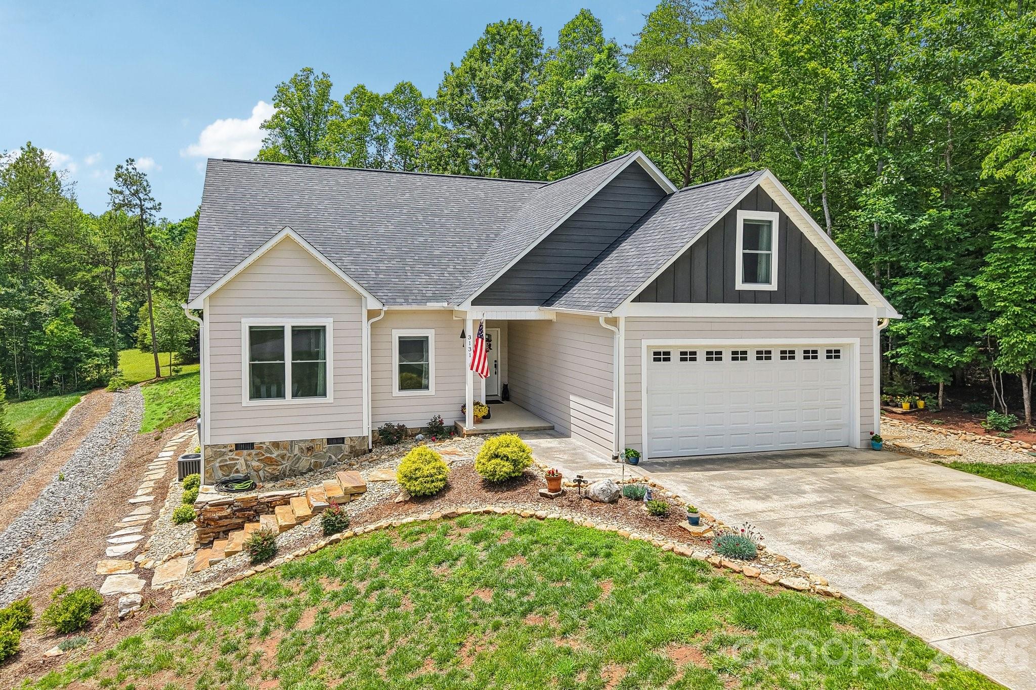 Discover the charm of countryside living with everyday convenience at 3131 Richard Street in Morganton. This inviting 3-bedroom, 2-bath home features a bright, open floor plan designed for comfortable living and easy entertaining. The kitchen, dining, and living areas flow together to create a welcoming central gathering space, while the finished room over the garage offers flexible use as a home office, hobby room, media space, or guest overflow area.

Outside, the expansive yard provides room to relax, garden, play, or simply enjoy the natural surroundings. Colorful flowers, visiting birds, and butterflies add to the peaceful setting, while the open night sky offers wonderful opportunities for stargazing. A neighboring forest tract enhances the rustic feel and contributes to the property’s sense of space.

Enjoy a setting where nature, comfort, and convenience come together—schedule your private showing today!
