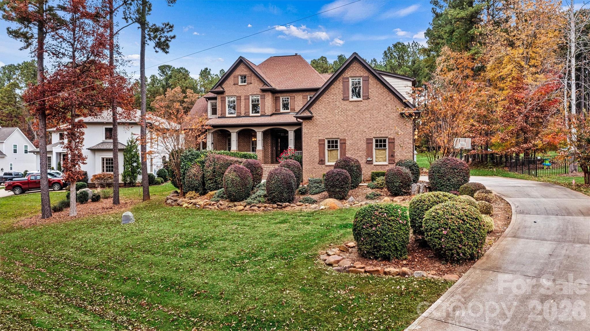 Stunning Full Brick Custom Home in the Lakefront Community of Woodleaf

Welcome to this beautiful traditional home nestled in the sought-after lakefront community of Woodleaf. Designed with comfort and elegance in mind, this full-brick custom residence offers exceptional space for both living and entertaining. Conveniently situated outside the busy Hwy 150 zone, the property maintains peaceful privacy while remaining close to shopping, schools, and restaurants.

Property Highlights:

  - Spacious Living: Featuring 4 bedrooms and 4.5 baths.
  - Chef’s Kitchen: A dream workspace complete with custom cabinetry, granite countertops, a generous island with eat-in bar seating, and an open layout flowing into a cozy sitting area and breakfast nook.
  - Great Room: Boasts soaring ceilings and expansive windows that fill the space with natural light, complemented by a second-story balcony overlook.
  - Luxurious Master Suite: Offers vaulted ceilings and a master bath featuring a large tiled shower with dual shower heads, extensive cabinetry, and two spacious walk-in closets.
  - Flexible Bonus Space: The large upstairs bonus room includes a full ensuite bath and is ideal for a private home office or homeschooling.

All upstairs bedrooms are generously sized to provide comfort and privacy for everyone. Outside, the back deck overlooks a deep, beautifully landscaped lot that is perfect for outdoor gatherings and offers plenty of room to add a pool.

The home’s remarkable curb appeal is anchored by a three-car garage and extensive stone landscaping. Experience quality craftsmanship, timeless style, and the welcoming charm of lakefront living—with Lake Norman boat launches just minutes away, this is more than a home; it’s a lifestyle.

--