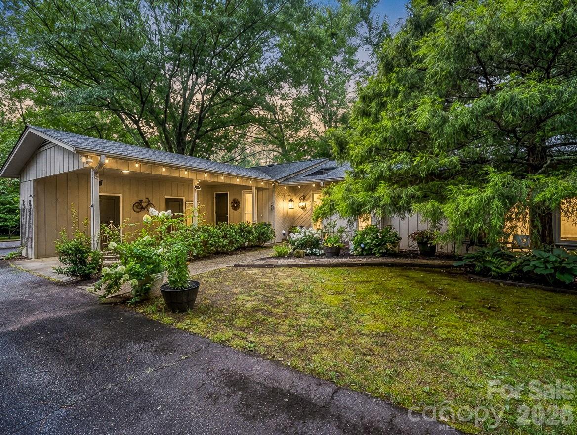 Imagine coming home to a peaceful retreat where comfort, style, and effortless living come together. This beautifully maintained, move-in ready condo welcomes you with an abundance of natural light and an inviting open floor plan designed for both everyday living and entertaining. Rich engineered hardwood flooring flows throughout the main living areas, complemented by elegant crown molding, wide baseboards and smooth ceilings that create a timeless, refined feel. A spacious foyer with a convenient powder room leads into the warm and welcoming living and dining area, where a cozy gas-log fireplace, custom built-in shelving, and picturesque views of the park-like grounds create the perfect setting to relax and unwind. The heart of the home is the spacious kitchen, completely renovated down to the studs and thoughtfully redesigned with updated cabinetry, stylish finishes, durable vinyl flooring, a pantry, and a conveniently located laundry area. Whether preparing a quiet meal or hosting family and friends, this space is both beautiful and functional. The spacious primary suite offers generous closet space and an updated private bath, creating a peaceful sanctuary at the end of the day. Equally impressive, the second primary ensuite provides exceptional flexibility for guests, multigenerational living, or a private retreat, featuring its own beautifully updated bath with a new vanity.  Step outside to your private sundeck and enjoy your morning coffee surrounded by nature or spend the evening relaxing in the tranquil setting. A one-car carport with abundant storage adds everyday convenience, while the association maintains the front gardens and exterior landscaping, allowing you to spend more time enjoying life and less time on maintenance.  With quality updates throughout, two private ensuite bedrooms, and a peaceful setting that feels like a private retreat, this exceptional condo offers the perfect blend of comfort, convenience, and carefree living. Come experience the lifestyle you've been looking for and schedule your private showing today.