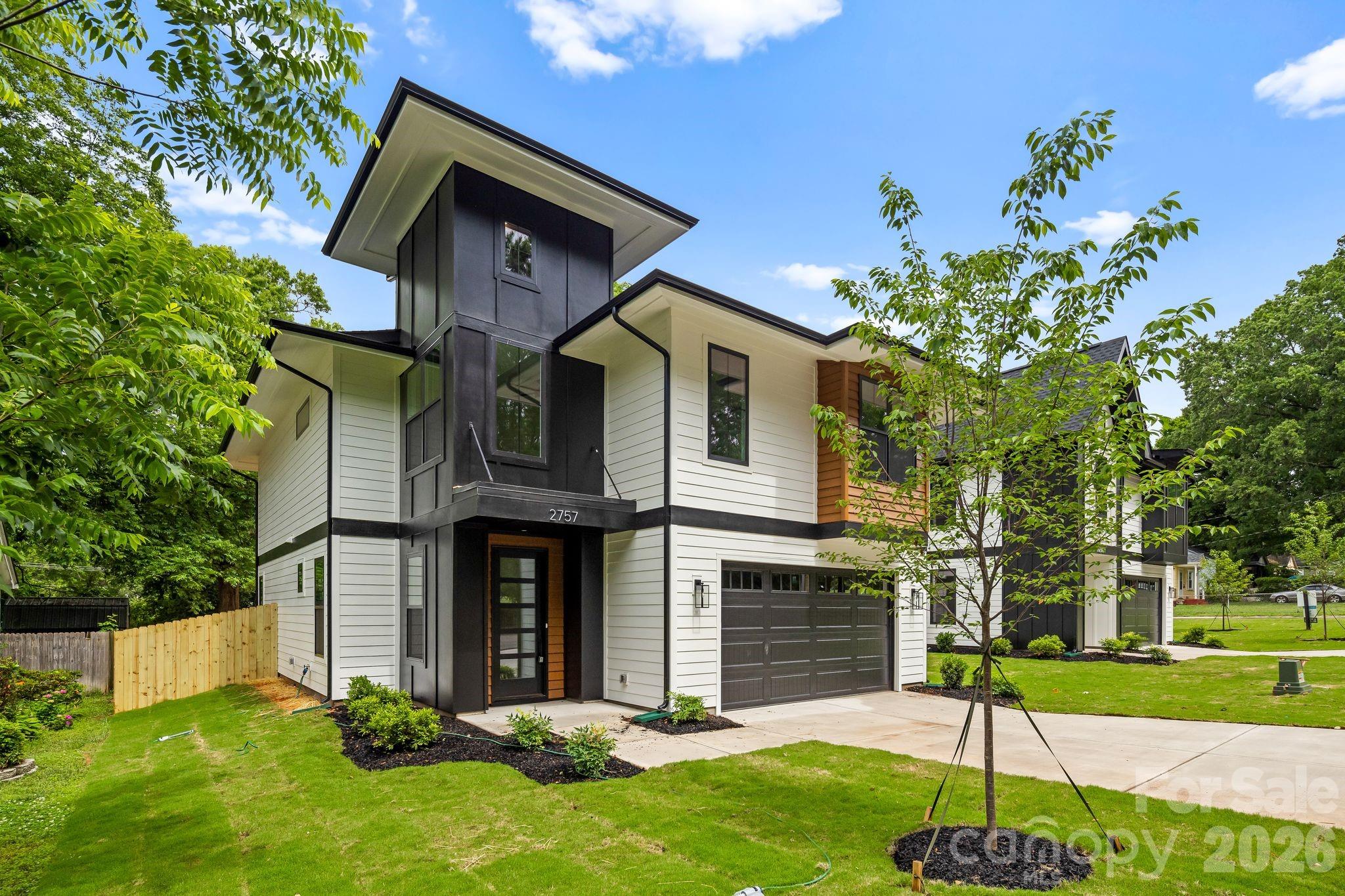 Experience prime Enderly Park location in this brand new build and enjoy views of the park and Uptown from the front yard. This beautifully designed modern residence is complete and move-in ready, offering you the rare opportunity to be the first owner to enjoy this spectacular build from KO Construction. Step inside to an open, spacious living area that flows seamlessly into a large gourmet kitchen and dining space – perfect for entertaining. Elevated modern finishes impress at every turn: beautiful engineered hardwood floors throughout, custom-level tile in the kitchen and bathrooms, and sleek, high-end selections that elevate the entire home. Prepare to be wowed by the expansive primary suite – a true retreat with generous space and luxurious details. The home will feature a convenient two-car garage, sodded front yard, and a fully fenced backyard. Complete with a builder warranty for complete peace of mind. Don’t miss your chance to own a brand-new home in one of Charlotte’s most desirable up-and-coming areas!