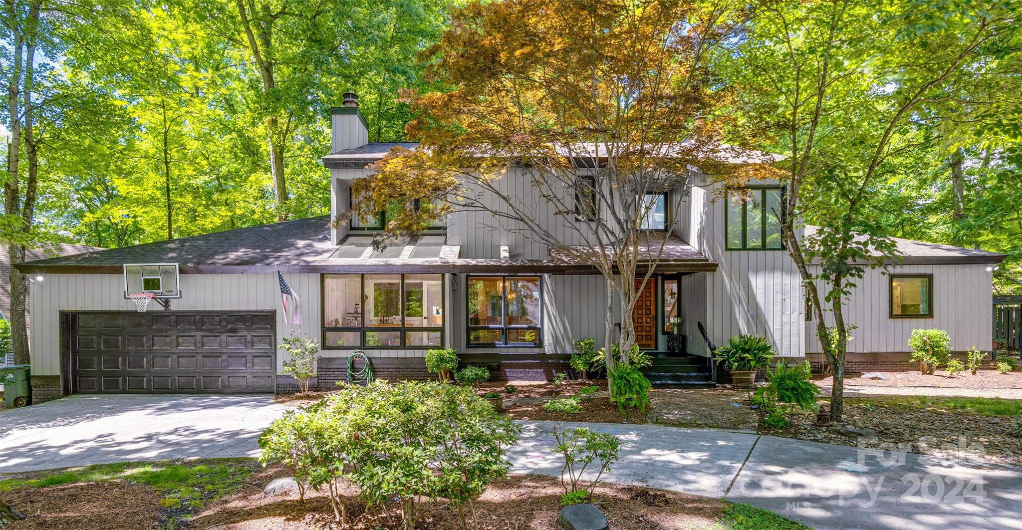 MULTIPLE OFFERS RECIEVED: highest & best due 6/12 by noon. Welcome to your new dream home within the prestigious, amenity-rich, 24-7 gated waterfront community of River Hills, served by award-winning Clover schools. This contemporary masterpiece features a fully remodeled home with sprawling hardwood floors throughout. From the kitchen to the primary bathroom, everything has been elegantly redesigned with luxurious fixtures, even including a new laundry room and custom closets. Natural light floods the high ceilings, highlighting the home's beauty and functionality, with the primary suite on the main level. Another room on the main level is functional for an office, flex, or bedroom. Perfect for entertaining, this home offers multiple living areas, including a brand-new back deck with an additional covered & screened porch. The large, shaded backyard is fenced for privacy and designed for low maintenance. Enjoy peace of mind with brand-new HVAC, all-new ductwork, and new crawlspace