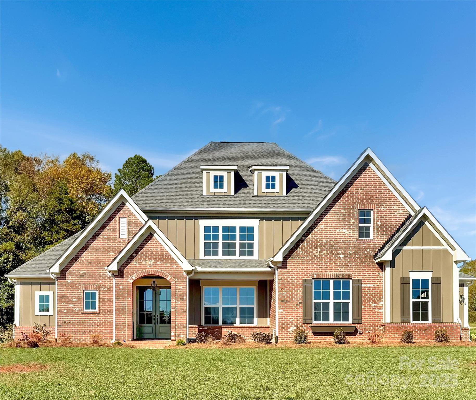 Welcome to this expansive 4-bedroom, 4-bath home combines impressive architecture with everyday functionality. A soaring two-story family room creates a dramatic focal point, filling the main living space with natural light and an open, airy feel. The private main-floor suite offers a peaceful escape with generous space and a bathroom showcasing a freestanding tub and a shower. Upstairs, a large bonus room provides flexible space for a media room, playroom, or home office. With a 3-car garage, there’s plenty of room for storage, hobbies, or extra vehicles—making this home as practical as it is stunning.
Saddlehorn is conveniently located 10 minutes from I-77, near both Charlotte and Mooresville. Lake life is just around the corner, with boat storage and access to Lake Norman less than a mile away, making it easy to enjoy weekends on the water. Indulge in the expansive private homesites that offer both serenity and space, making this the perfect place to call home!