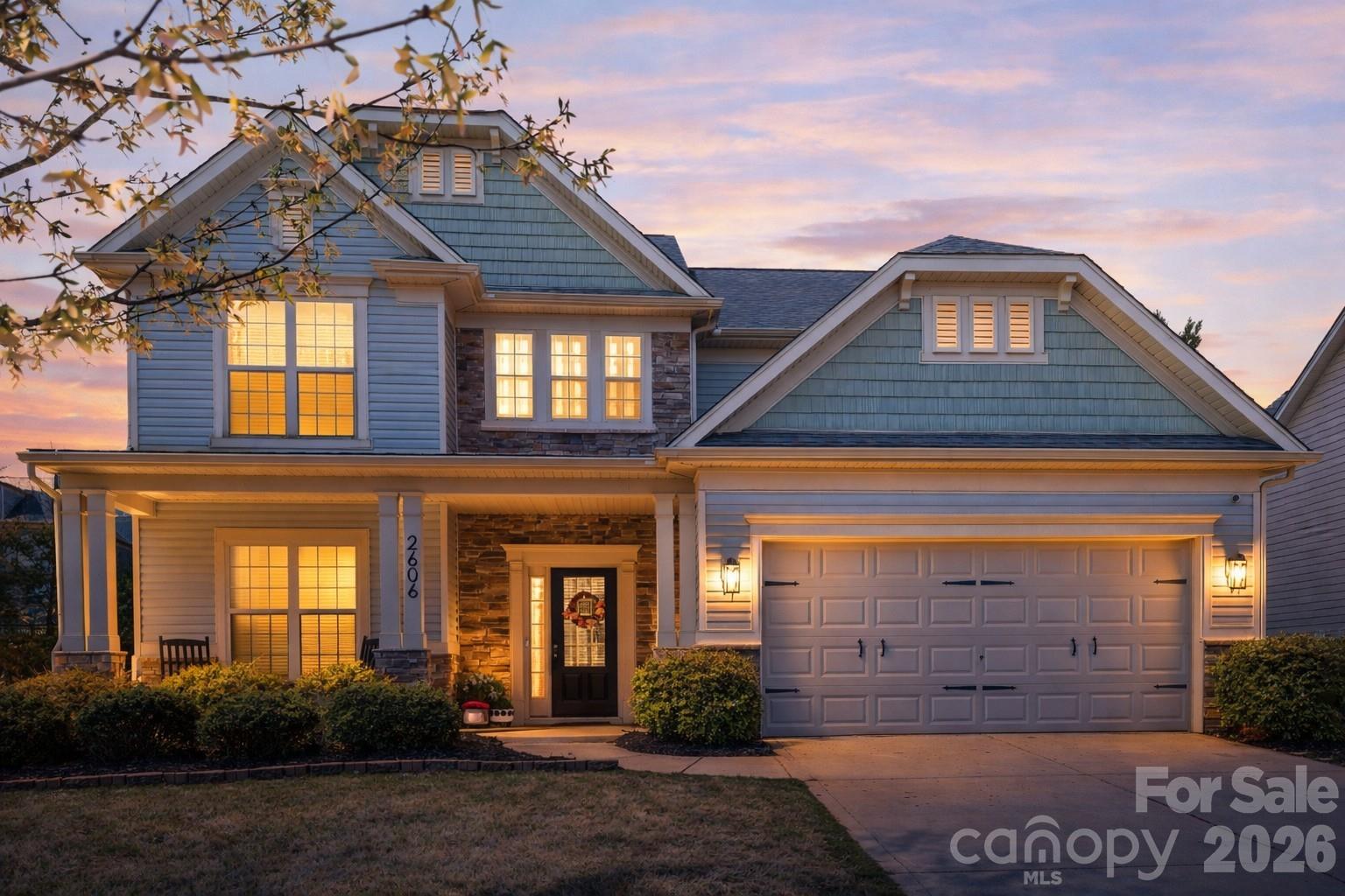 Welcome home to this beautifully maintained property in the desirable Audubon Lakes community, featuring a functional layout and inviting living spaces throughout. Brand new LVP flooring runs across the main level, offering both durability and a fresh, modern look. A dedicated dining room with tray ceiling creates a great setting for gatherings. The kitchen has been thoughtfully updated with elevated quartz countertops, a modern tile backsplash, gas range, stainless appliances, ample cabinetry, and a walk-in pantry, and opens to the breakfast area overlooking the private backyard.

A main-level guest suite with a full bath is ideal for visitors or multi-generational living. Upstairs, the spacious primary suite features a tray ceiling, beautiful LVP flooring, and custom wainscoting for a refined touch. The en-suite bath includes dual vanities, a soaking tub, and a separate shower. A large loft provides flexible space for a media room, home office, or play area.

Additional custom details include a shiplap fireplace feature wall, adding character and warmth to the main living area. The home is perfectly positioned facing trees and offers one of the most private backyards in the neighborhood. Enjoy the fenced yard with a level lawn and extended patio—ideal for entertaining or relaxing outdoors.

Located in fast-growing Indian Land and just minutes from all that Ballantyne has to offer, this home provides easy access to shopping, dining, and major roadways while still enjoying a quieter community setting!