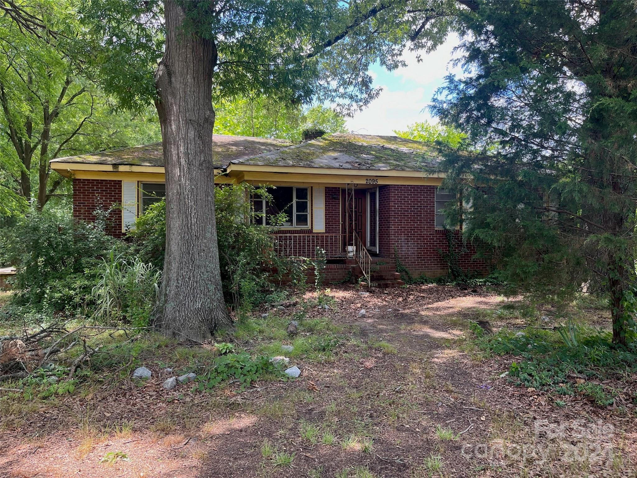 BACK ON THE MARKET DUE TO NO FAULT OF THE SELLERS! Investors! Priced to sell. This 4 bedroom 1 bath all brick ranch with a full basement is ready for you to bring it back to its prime. Detached workshop is included. Driveway goes around the right side of the home to the back where the basement garage is as well as the workshop. The house is in need of a full remodel. All personal property present at showing will convey. Parcel #136050 will convey with the property at no value with an accepted offer, this parcel may need to be surveyed.