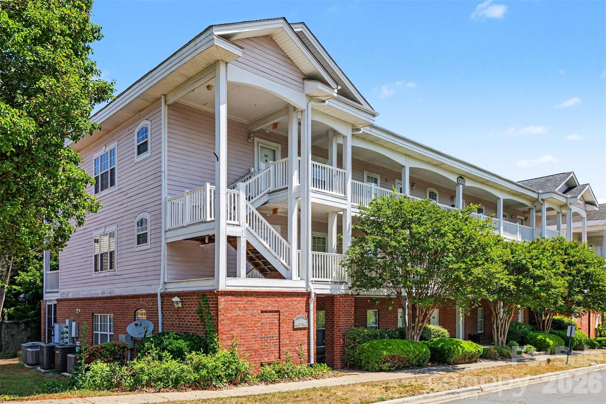 Welcome to Heatherstone, where comfort and convenient living come together in this beautiful 2-bedroom, 2-bath condo in the heart of Charlotte’s University area. Located on the third floor, this bright and airy home features an open-concept layout with vaulted ceilings, abundant natural light, and stylish flooring throughout the main living spaces. The spacious living and dining areas flow seamlessly to a covered balcony, creating the perfect space to relax or entertain.
The kitchen offers generous cabinet space, charming arched window details, and an easy connection to the main living area for everyday functionality. The split-bedroom floor plan provides privacy, with a large primary suite featuring oversized windows, a walk-in closet area, and an en-suite bath. A dedicated laundry area and additional storage space add convenience to daily living.
Ideally situated just minutes from UNC Charlotte, this location provides quick access to I-485, I-85, and the Lynx Blue Line extension, making commuting around Charlotte efficient. Residents enjoy close proximity to shopping, dining, grocery stores, parks, and entertainment. This move-in ready condo offers exceptional value in one of Charlotte’s fastest-growing areas.
