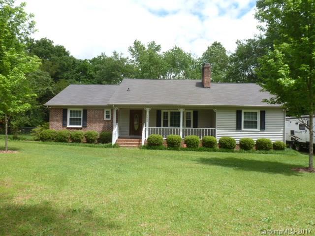 Imagine sitting on your back deck enjoying your coffee, looking over the 5th green of the golf course, you can have that with this 3BR, 2BA home. Large front porch, over an acre lot. Home features living room with fireplace, fml dining room with french doors leading out to the deck, fenced back yard, kitchen with breakfast area with bay window, all appliances remain, large master bedroom, laundry room. Make your appointment today!