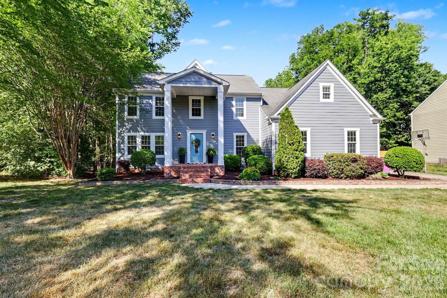 Welcome to 12227 Provincetowne Drive in the desirable Williamsburg neighborhood of Ballantyne. Beautifully remodeled Kitchen, New James Hardie Plank Siding, New & Resurfaced Hardwood Floors, Tankless Water Heater, Plantation Shutters, screen in Porch and so much more. Situated on a rare .52-acre lot, one of the largest properties in the community, this beautifully updated 5-bedroom, 2.5-bath home offers 2854 square feet of move-in ready living space in an unbeatable location. The heart of the home is the stunning chef's kitchen, fully renovated within the past year with style and function in mind. Additional upgrades include James Hardie plank siding installed in August, fresh paint, remodeled upstairs bath and powder room, tankless water heater, plantation shutters, and hardwood floors throughout the main living areas. Upstairs, all bedrooms are thoughtfully positioned, including a spacious primary suite with a walk-in closet. The versatile fifth bedroom/bonus room offers flexible space for a guest room, playroom, media room, home office, or gym. Step outside to enjoy the screened porch overlooking a large fenced backyard with endless room to play, entertain, or relax. Additional features include a finished 2-car garage and HVAC replaced in 2019. Located in a sought-after school district with zoning for Polo Ridge Elementary, Cato Ridge Middle School, and Ballantyne Ridge High School. This home is also minutes from Stonecrest at Piper Glen, Blakeney Shopping Center, Waverly, and I-485. Exceptional lot. Prime Ballantyne location. Move in ready. NO HOA dues!