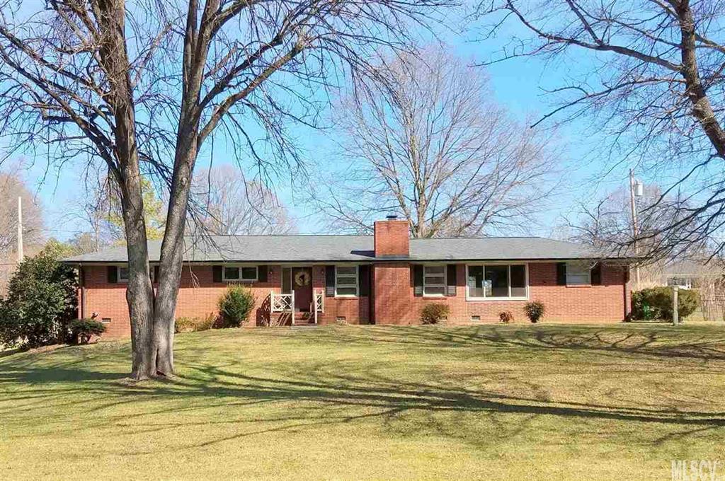 3BR/1.5BA all brick home is MOVE IN READY! Located in Coulwood Hills subdivision. Cozy living room with gas fireplace, beautiful dining room off large open kitchen with updated appliances.  Master bedroom with walk in closet and half bath. Refinished hardwood floors throughout , Rinnai gas water heater, ceramic tile in bathrooms, single garage and on over half an acre lot!! Convenient to 485, 77, Airport, Uptown Charlotte & US National Whitewater Center. Mt. Island Lake just a few miles away.