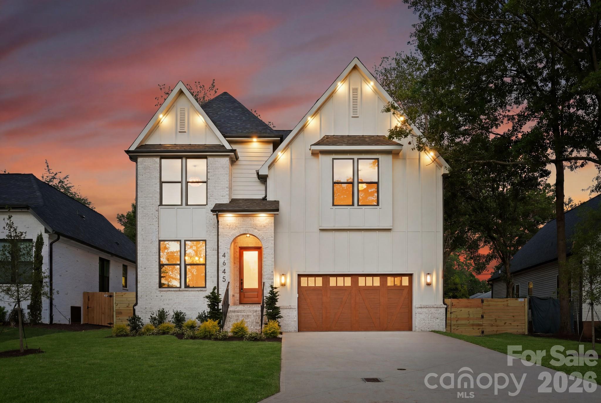 Introducing the newest residence in the Signature Series, a collection of luxury new-construction homes throughout Charlotte. Located in the heart of Madison Park, one of Charlotte's most sought-after and established neighborhoods, 4645 Connecting Road offers exceptional craftsmanship, elevated design, and modern livability with convenient access to Park Road Shopping Center, SouthPark, South End, major roadways, Charlotte Douglas International Airport, and the Charlotte area's top private and public schools. Step inside and the quality speaks for itself. The open-concept main level was designed for effortless living and entertaining, where a generous living room flows naturally into the dining area and a stunning chef's kitchen adorned with quartz countertops, a tile backsplash, glass display cabinetry, and a custom built-in bar finished to perfection. Designer lighting and soaring 10-foot ceilings carry throughout, while wide-plank engineered hardwood floors ground every space with warmth and sophistication. A private office just off the main living area offers the flexibility today's buyers need, and the oversized two-car garage adds everyday convenience. Upstairs, the primary suite is nothing short of a sanctuary. A spacious walk-in closet with custom shelving and a spa-inspired bath with dual vanities create a private retreat you will never want to leave. Three additional guest bedrooms are thoughtfully arranged, offering both privacy and connection through a beautifully appointed Jack-and-Jill bath with separate vanity areas and a dedicated ensuite bedroom for added flexibility. Out back, a covered patio with a dining area and an outdoor fireplace extends the living space beyond the home's walls, while a fully fenced backyard offers privacy and room to enjoy it all. With engineered hardwoods throughout, designer lighting at every turn, premium finishes, and exceptional unseen values, this home delivers elevated new-construction living in one of Charlotte's most coveted neighborhoods. Signature Series homes are celebrated for a reason and they rarely stay on the market. Don't miss your chance to call this one home.