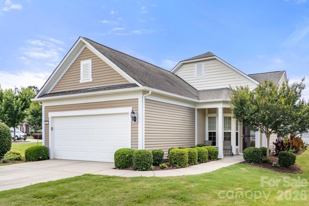 Welcome Home! You'll love this easy to maintain home in the popular and friendly Whimbrel Circle neighborhood of Sun City Carolina Lakes. This Pine Spring floor plan offers wood floors throughout, three bedrooms, two baths, formal dining, and eat-in kitchen. Enjoy the outdoor space for entertaining or to enjoy your morning coffee.  This home sits on a large corner lot with beautiful landscaping. Carolina Lakes is an amenity-rich active adult community that offers 2 outdoor pools, 1 indoor pool, exercise facility, woodworking/stained glass studio, pottery studio, billards, clay tennis courts, pickleball, shuffleboard, bocce, hiking trails, and 160+ interest groups and clubs. Come and enjoy your retirement in this beautiful, easy to maintain home in beautiful Carolina Lakes.