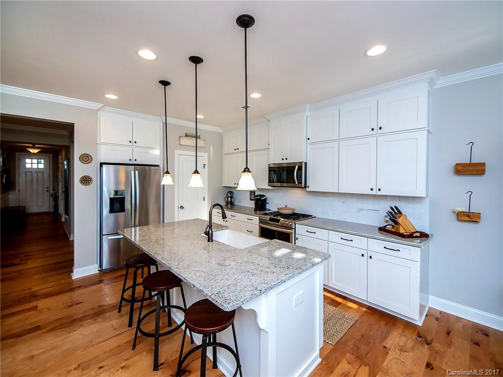 $20,000 LESS than BUILDING plus sellers added 10k worth of upgrades. Brand new home that has only been lived in for a few months! Lot's of unique features in this home including a new double gas oven, updated fixtures, and a custom built-in master closet & hardwood stairs. Check out the home & get a feel for this friendly neighborhood. Brayden has amenities that include Private Residents’ Club w/a competition pool, neighborhood pond, walking trails & parks. Even prettier in person!