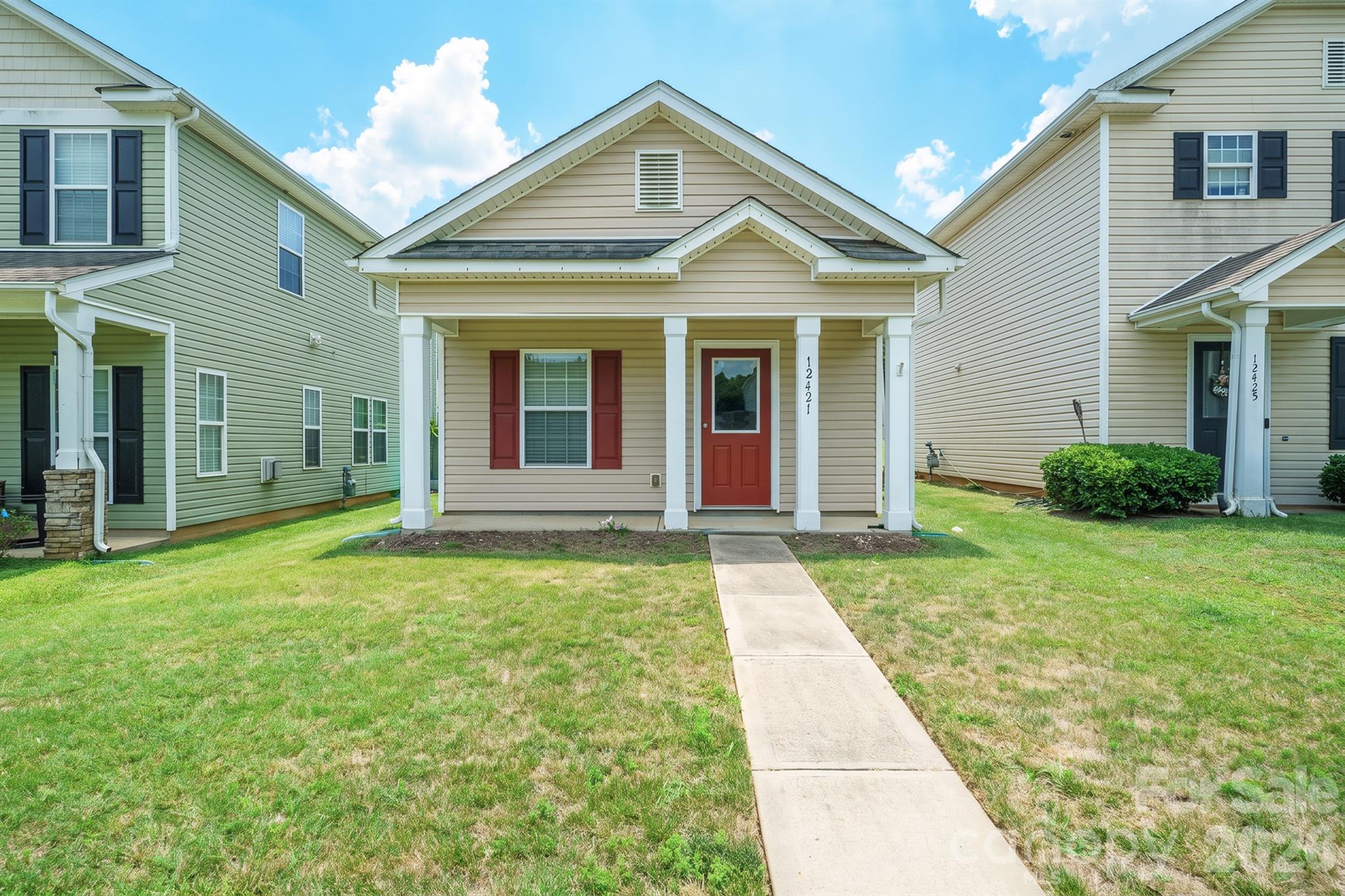 Charming and meticulously maintained, this move-in-ready home offers a highly desirable layout. The main level features a convenient bedroom with an attached full bathroom, perfect for guests or main-floor living. Upstairs, enjoy a private and spacious primary suite with its own dedicated bath. The bright kitchen boasts elegant granite countertops, an electric range, and matching appliances, complemented by a cozy eating area with a beautiful bay window. Outside, find dedicated rear parking and a practical 35-square-foot exterior storage room. Conveniently located within walking distance from the proposed Charlotte Red Line commuter rail corridor, offering potential future connectivity to Uptown Charlotte and northern Mecklenburg communities (project currently in advanced planning and design phases).