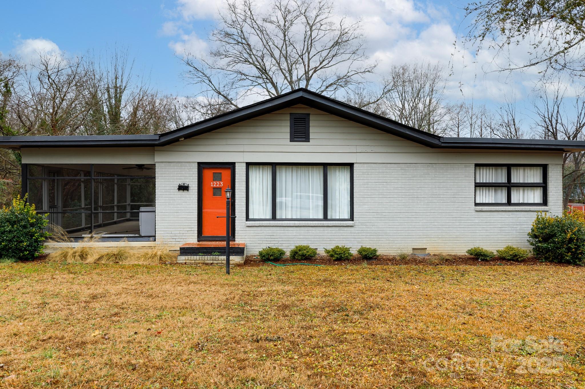 Welcome to this beautifully updated full-brick home in Fewell Estates! From the moment you step inside, you'll be captivated by the stunning kitchen, featuring quartz countertops, a stylish tile backsplash, a gas range, and abundant cabinet space—a dream for any home chef. Gorgeous hardwood floors flow throughout the main living areas, while tile flooring adds durability and style to the bathroom. The spacious living room exudes warmth and charm, centered around a wood-burning fireplace, perfect for cozy evenings. Outside, a huge screened porch invites you to unwind or entertain year-round. This home also features a new HVAC system installed in 2021, ensuring year-round comfort and efficiency. Thoughtfully updated and move-in ready, this home offers comfort, style, and convenience—all just minutes from shopping, dining, and the university!