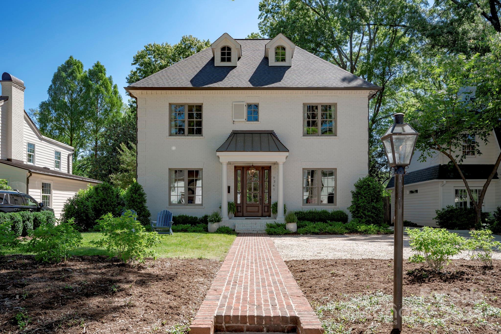 Discover this exquisite home in the highly sought-after Eastover neighborhood. Substantial renovations completed in 2020 offer the perfect blend of modern elegance and timeless charm. The beautifully renovated kitchen boasts a Wolf range oven, dual dishwashers, sleek countertops, and ample storage. The open floor plan flows seamlessly, with a wet bar conveniently located near the family room and the inviting covered rear porch, complete with a cozy fireplace. Indulge in the spa-like atmosphere of the spacious primary suite and bathroom, featuring ample walk-in closet space. 
The home's full unfinished basement presents a world of opportunities, with over 2,200 square feet of "blank canvas" to create the perfect extension of your living area. Whether you envision a home theater, fitness studio, game room, or even an in-law suite, the possibilities are limitless.