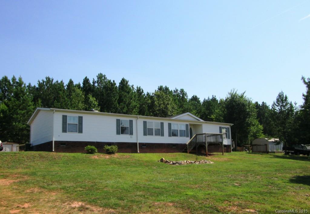 Spacious 4 bedroom and move in "NICE". Fully appliance with cabinets to spare. Fireplace in the great room. Master has vaulted ceiling and walk-in. Front deck, rear deck with ramp. Must see, must have! Enjoy the 1 plus acres!! 1 YR AMERICA'S PREFERRED HOME WARRANTY IN PLACE Title has been retired