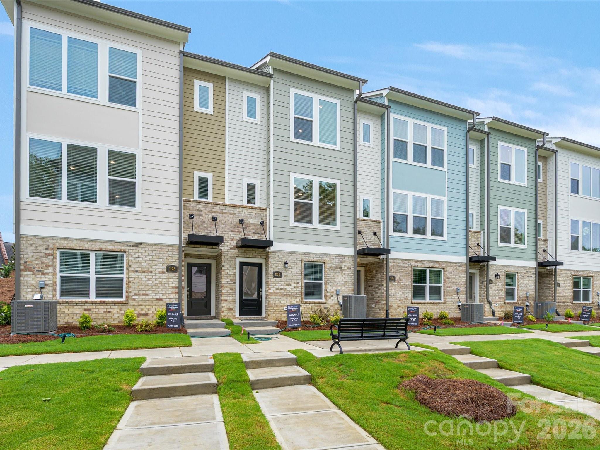 Tucked along a peaceful treeline, this three-story end-unit townhome by David Weekley Homes perfectly combines modern design, energy efficiency, and natural serenity. Featuring three bedrooms and three-and-a-half baths, this beautifully crafted home offers a bright and open floor plan with 9-foot ceilings, large windows, and elegant Shaw LVP flooring that enhance its inviting atmosphere.
The chef’s kitchen is both stylish and functional, showcasing granite countertops, 42-inch cabinets, and a spacious island—perfect for entertaining or enjoying everyday meals. Step out onto your private balcony to take in tranquil treescape views, offering a relaxing retreat right at home.
Upstairs, the primary suite impresses with a large walk-in closet and a luxurious en-suite bath. Built with EFL Certified construction, this home delivers long-lasting comfort and energy efficiency to help reduce utility costs.
Stylish, efficient, and surrounded by natural beauty, this home in Central Living at Craig truly has it all.