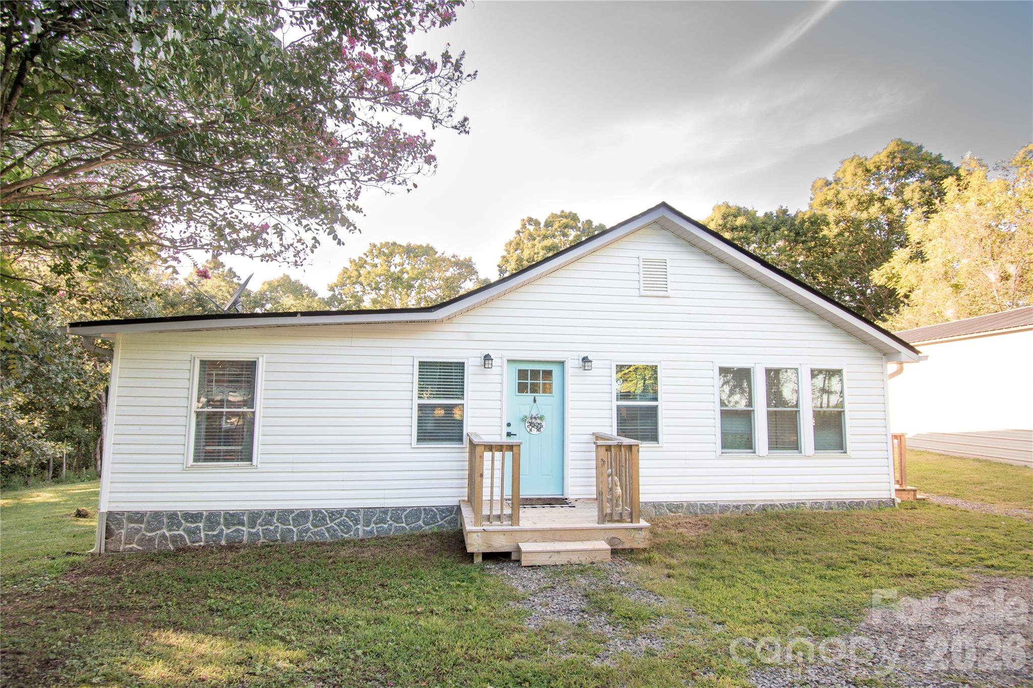 Completely remodeled home situated on nearly 2 acres, offering a peaceful country setting just under 10 miles from downtown Lincolnton. This move-in ready property blends charm with modern updates throughout.
The beautifully updated kitchen features a large island, subway tile backsplash, and plenty of space for cooking and gathering. Both bathrooms have been thoughtfully renovated with stylish finishes.
Spacious bedrooms provide comfort and flexibility, along with an additional flex area perfect for a home office, workout space, or hobby room.
Outside, you’ll find a 1,000 sq ft detached garage complete with insulation, power, and a concrete floor—ideal for storage, a workshop, or extra parking. An additional storage building with power provides even more space and versatility. New water filtration system, new hot water heater. Per previous sellers roof and siding was replaced 2023. 
Please note: the large detached carport and hot tub does not convey.
Enjoy the privacy of country living with the convenience of nearby town amenities!