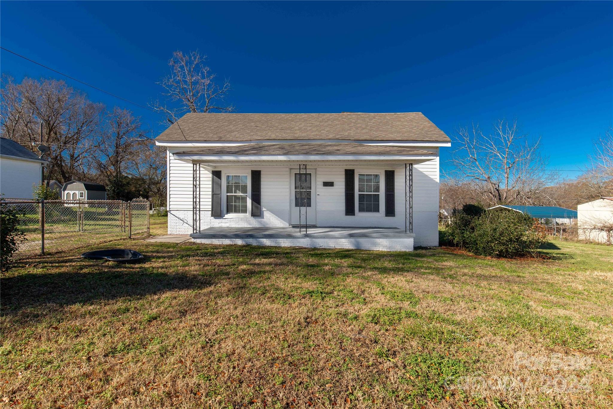 Back on Market, no fault of the Seller.  Home inspected and Seller is making minir repairs.  Fully renovated bungalow including new insulated windows, new flooring, fresh paint, newer kitchen appliances and new kitchen cabinets. Fireplaces are capped off and have not been in use for many years.  Fenced in front and back yard.  Nice trees including a pecan tree.  10 year old central air & gas heat system, roof replaced in 2018 and 3 year old electric water heater. Clover Schools and minutes from restaurants and shopping.