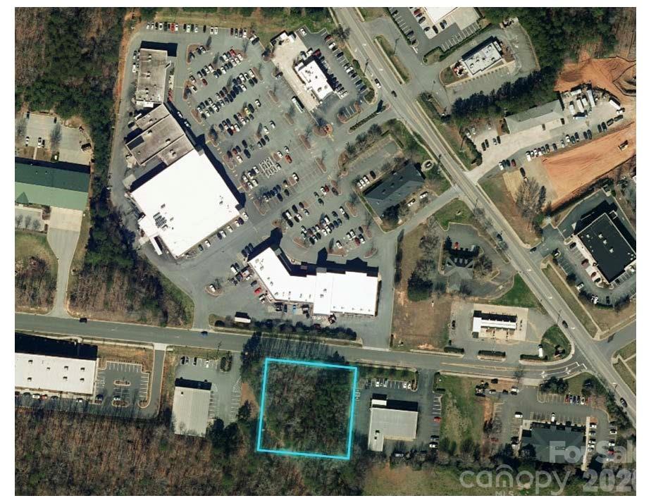 Prime Opportunity for Business Owner or Investment! There are not many commercially zoned undeveloped lots available in Waxhaw. Sandwiched between an auto shop NTB ( National Tire and Battery) and Dollar General. A Foodlion Anchor sits across the street with many other restaurants, retail, and businesses. The parcel is 1.3 acres. The NCDOT has future plans to connect Waxhaw Parkway to Hwy 75 as a corridor around downtown Waxhaw increasing future vehicular traffic. (Seller does not guarantee any future roadway plans and buyer is to verify) Water, Electric, Sewer, and Gas is all available (No Taps or Tap Fees are paid) There continues to be a lot of growth in Waxhaw which makes this lot a perfect oppotunity for your business or investment portfolio.