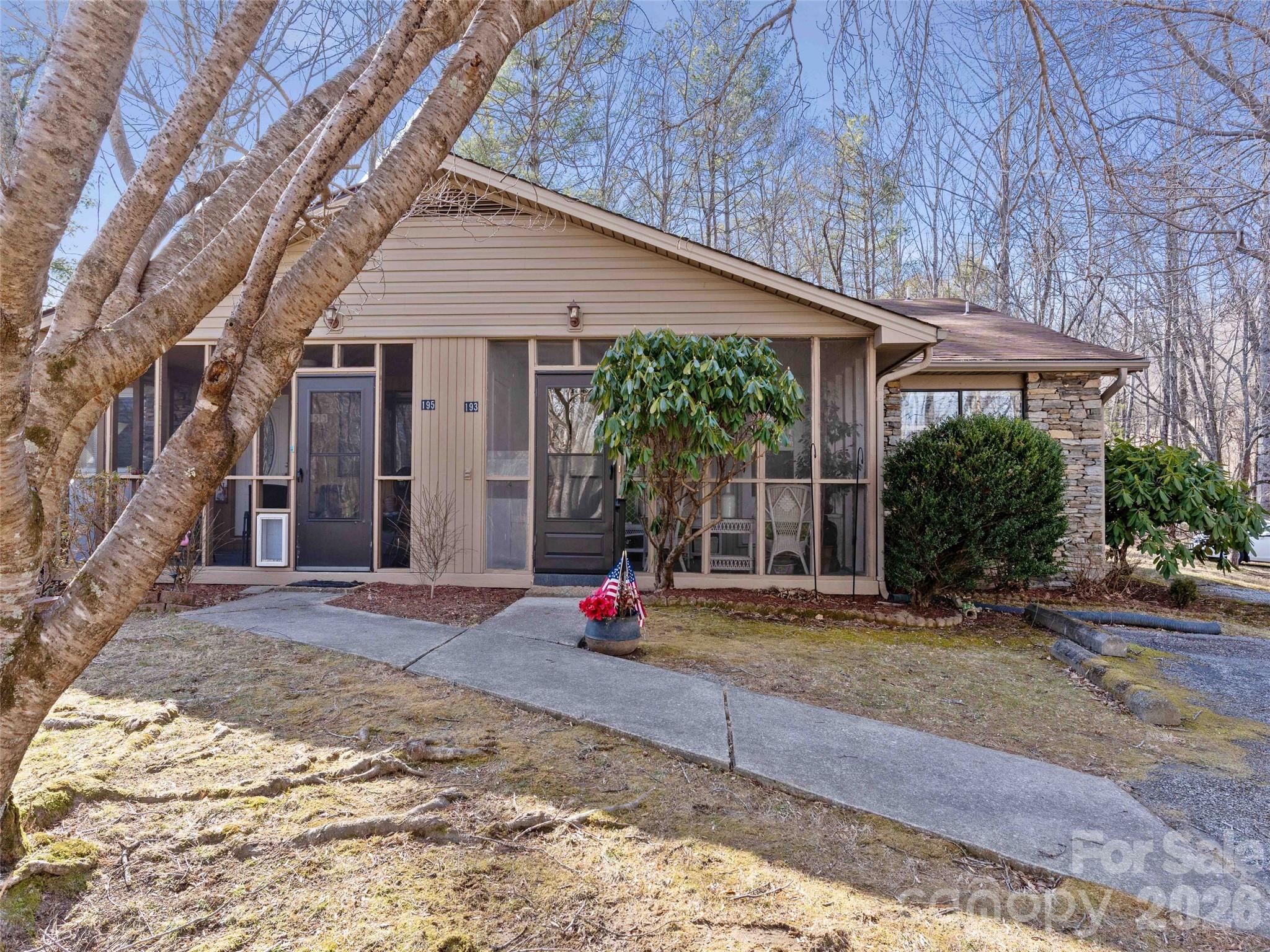 Discover the charm of this exceptional condominium located in the tranquil 55+ Floral Woods community. Located in the "Heart of Apple Country", this spacious property stands as one of the largest and most private units available. Featuring 2 bedrooms and 2 bathrooms with large private back deck and screened front porch, this is a great opportunity for the price. Don't miss out on this rare opportunity to own a spacious condominium in the desirable Floral Woods community. This property combines the best features of peaceful living with the perks of community life. Schedule your showing today!