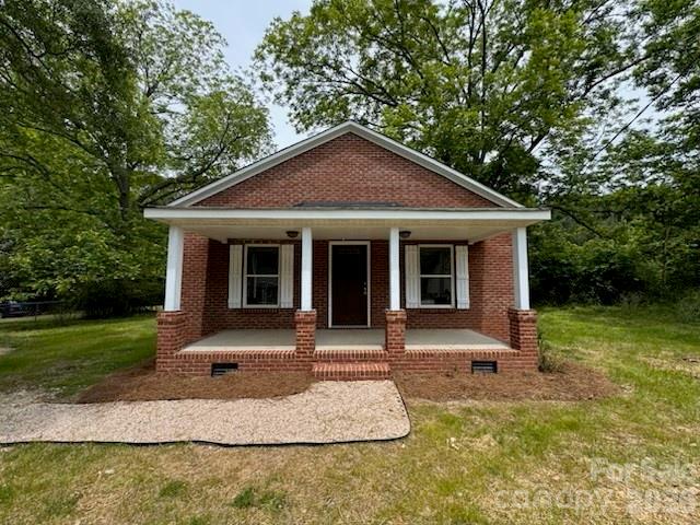 Move-In Ready & Fully Renovated! This charming home blends modern style with everyday comfort. From the moment you step onto the welcoming covered front porch, you’ll notice the care and attention poured into every detail. Inside, brandnew luxury vinyl plank flooring stretches throughout the entire home, creating a seamless and stylish flow. The completely updated kitchen shines with quartz countertops, all-new cabinets, and stainless steel appliances, perfect for whipping up your next masterpiece. The open layout leads into a cozy living area and a convenient laundry nook. Two spacious bedrooms offer ceiling fans and natural light, while the updated full bath features a modern vanity and a fresh shower/tub combo. A bonus half bath adds extra convenience, and the expansive backyard is ideal for relaxing, gardening, or entertaining. Whether you're a first-time buyer or looking to downsize in style, this home is a must-see!