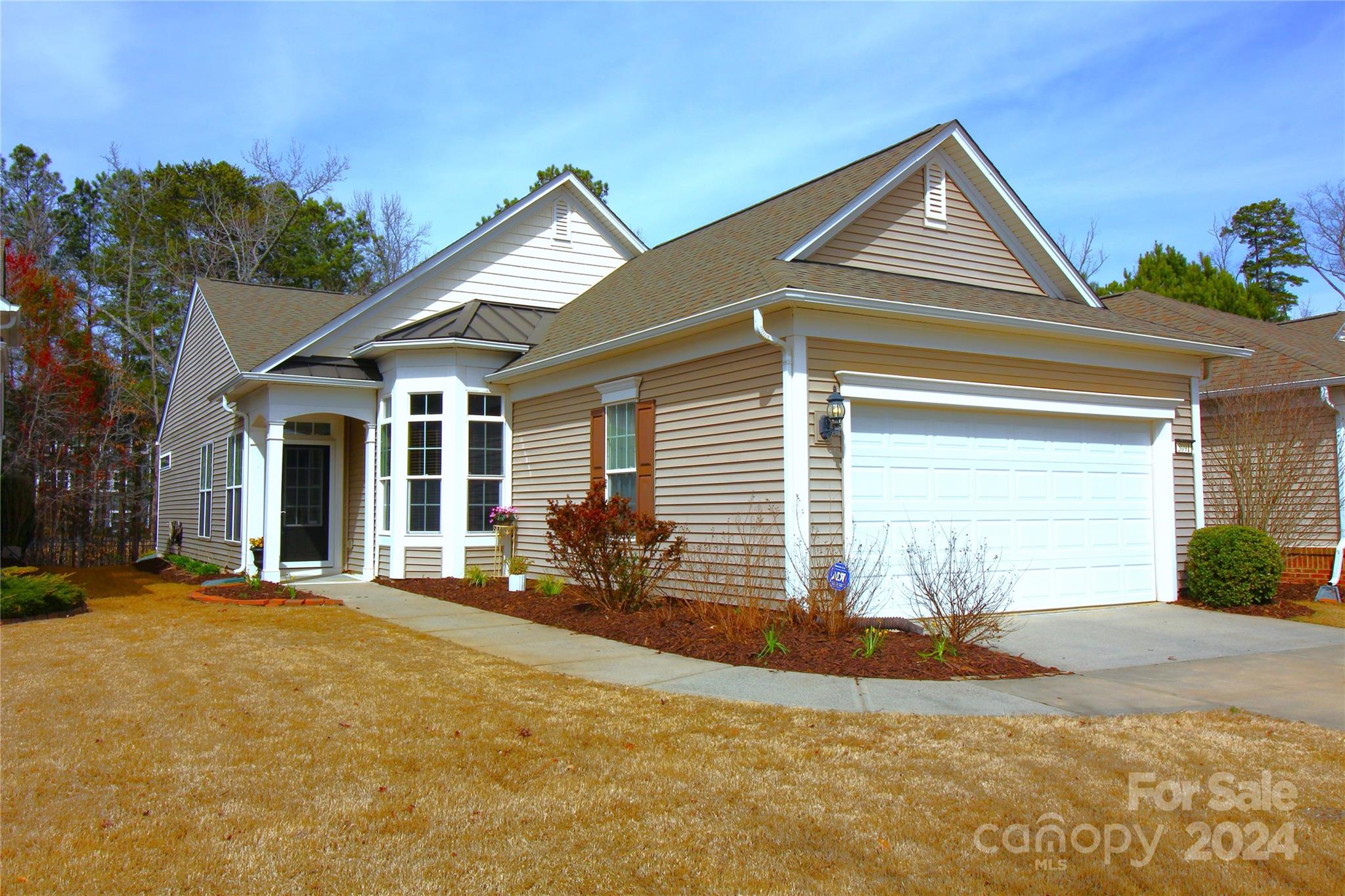 It's Finally Time To Live That Resort Lifestyle You've Dreamed Of!!Beautiful 3Bd/2Bth Ranch on Premium Wooded Lot in Highly Sought After Sun City Carolina Lakes~Home is Located on Quiet Street w/No Thru Traffic~Enjoy Your Time on the Semi-priv Extended Patio w/Electric Awning & Wooded Views~Cozy 3Season Rm~Spacious Kitchen w/Solid Surface Cntrs & Tile Bkspl~Built in Work Station~SS Appl~Breakfast Area w/Bay Window~Pantry~Huge Liv Area w/Sliding Drs to Sunrm~Prim Suite w/Lge Walk-in Closet w/Built-in Shelving~Prim Bth w/Dual Sink & Walk-in Stall Shw~3rd Bd/Flex Rm w/French Drs Can Also Be Used as Offc/Guest/Gym/Craft Rm etc~Extend Your Liv Area in the Insulated Garage w/Retractable Screened Panel & Entry Dr~Utility Sink & Built In Ironing Brd Complete the Space!Gutter Guards~This Amazing Community Offers Tennis Crts/Indr & Outdr Pools/Lakes/Fit Cntr/Club House/Sports Crts/Activities/Pickleball-Easy Access to Dining/Shopping etc.The List is ENDLESS!Come Fall in Love w/Your New Lifestyle!