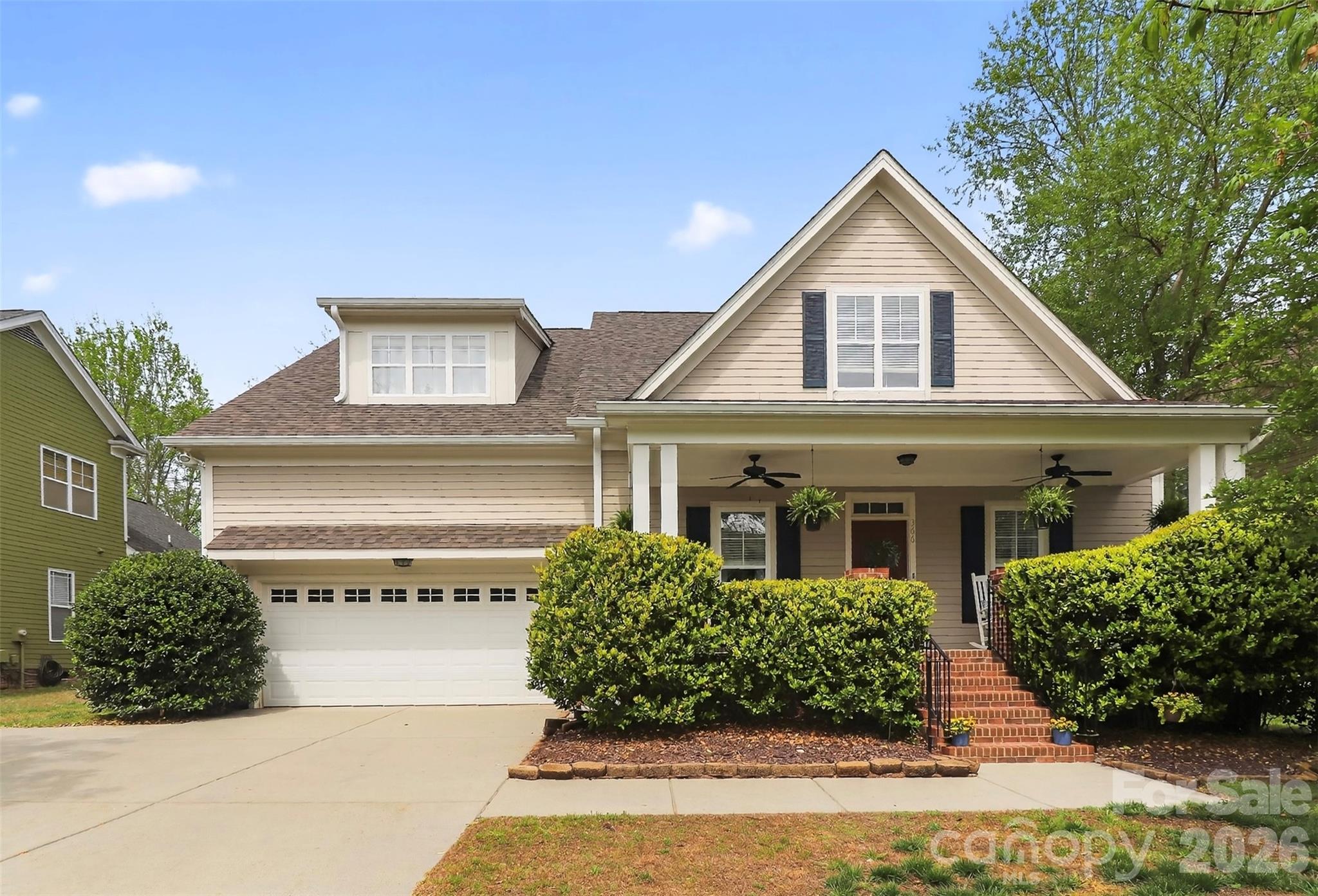 BIG-TICKET UPDATES ALREADY DONE! New roof and gutters (2023), two new HVAC systems (2025), full-home replumb, updated crawlspace with new vapor barrier and insulation (2023), refinished hardwood floors, fresh interior paint, and newer carpet, offering true move-in-ready peace of mind.

Rarely found in Tega Cay, this versatile floor plan features TWO primary suites on the main level, each with a private bath and walk-in closet, making it ideal for multi-generational living, guests, or aging-in-place convenience.

The updated kitchen is equipped with granite countertops, tile backsplash, newer stainless steel appliances, breakfast bar seating, and glass-front cabinetry. Extensive moldings, detailed trim work, and rich hardwood flooring create warmth and character throughout.
The spacious primary retreat features a tray ceiling and spa-like bath with a whirlpool tub and raised dual vanity. Upstairs, a large loft offers flexible space for a media room, office, or playroom, along with an additional ensuite bedroom, another secondary bedroom, and a full bath. Plenty of storage includes walk-in attic access.

Step outside to a fully fenced, tree-lined backyard with a spacious deck—perfect for entertaining, relaxing, or enjoying the privacy of your outdoor space.

Located in the heart of Tega Cay, one of the Carolinas' most sought-after lakefront golf course communities, residents enjoy golf, boating, trails, parks, recreation, and a strong sense of community. Flexible living spaces, major system updates, and an unbeatable lifestyle make this home a standout opportunity. Easy access to Charlotte, Fort Mill, Rock Hill and I-77.