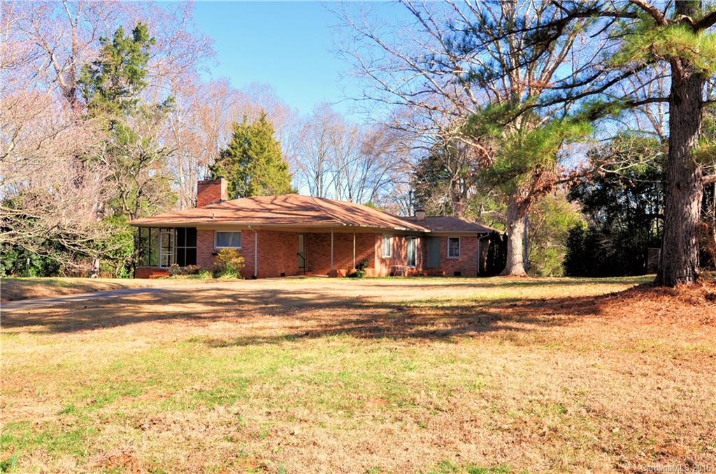 This wonderful all brick ranch boast just over 2100sqft with a beautifully redone master bath, walkout unfinished basement, and screened in porch! Beautiful flat lot with adjacent lot(Tax ID#631-01-11-009 Lot9) included with the sale making for 1 acre in Rock Hill! Great kitchen with breakfast bar and a lot of counter space that opens to the family room with gas fire place! 3 bedrooms, 2.5 baths, Dining room, walk out patio. Washer/Dryer to remain. Roof 8/16! Property being sold "AS IS".