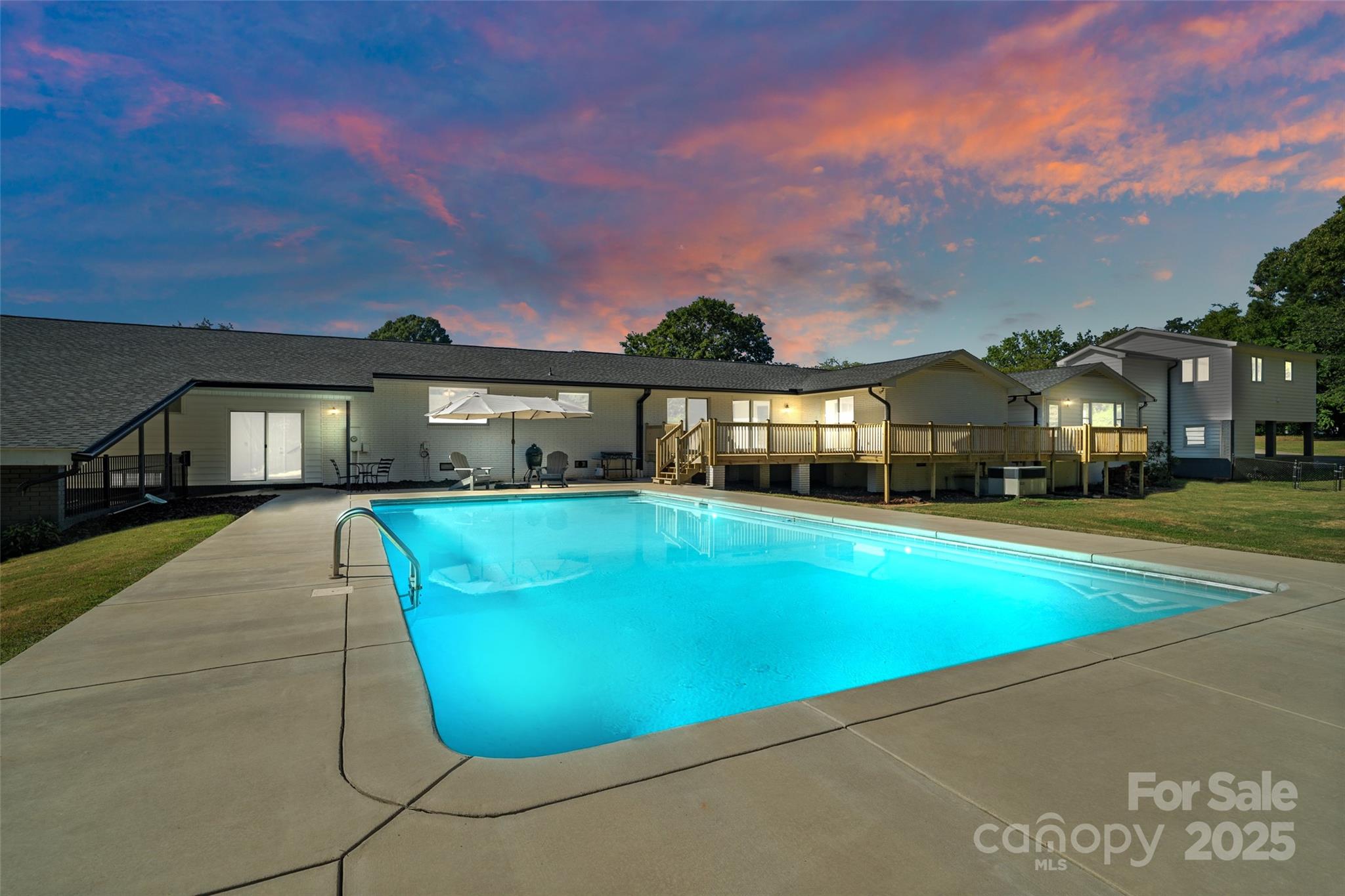 If you are looking for a retreat to call home, you found it!  Situated on a large 3.48 acre lot, this property offers multi-generational living or the potential to provide additional income. The attached apartment with second living quarters gives buyers multiple options for use.  Enjoy the new oversized deck overlooking the pool and yard that is big enough to entertain all your guests!  Located less than 10 minutes to downtown Rock Hill, this property offers the convenience of city living while being in the county.  The back portion of the acreage backs up to a creek with a park-like setting you won't want to miss.