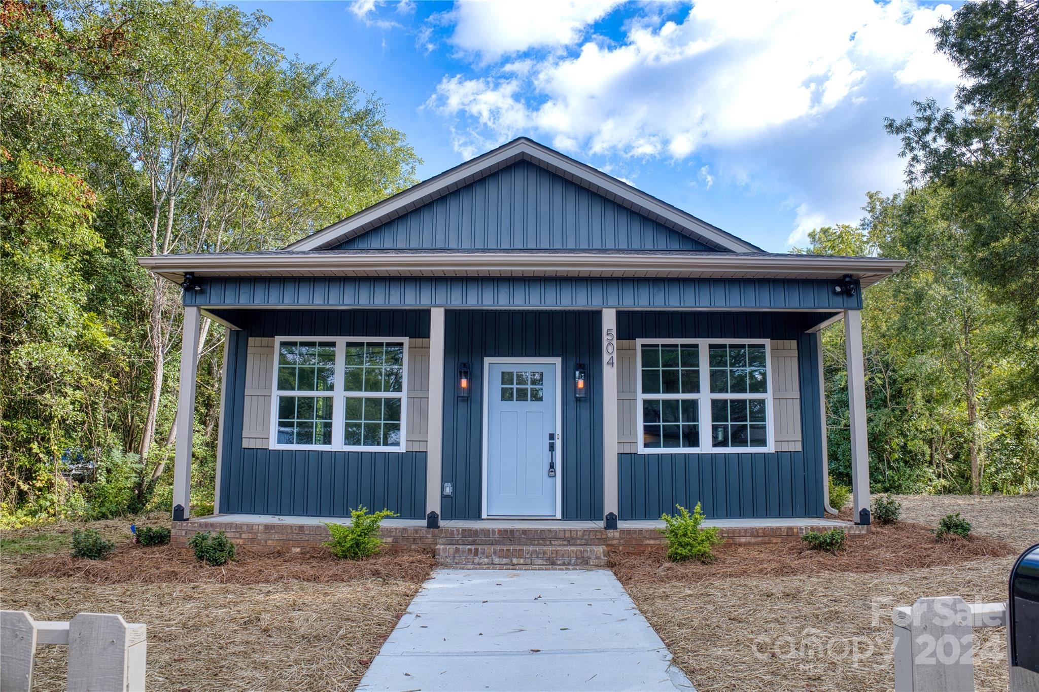 504 Hope Street is more than a spec home; it's built to be YOUR new home. With many fixture upgrades, beautiful finishes, and thoughtful designs, this home is cozy and comfortable close to the heart of Rock Hill, SC. Step inside to find an open-concept design with a bright and inviting living room, a spacious kitchen with hand-selected appliances, and a dining area that looks out towards the front of the home. The primary bedroom is a true retreat with it's beautifully tiled shower in the primary bathroom as well as a walk-in bedroom closet. High-end, bronze finishes and meticulous details make this house stand out. Enjoy the convenience of a concrete driveway that leads to a side porch entrance. Also, note the beautifully landscaped yard with fence perfectly placed framing the front of the property. Schedule your showing today and make this home yours!