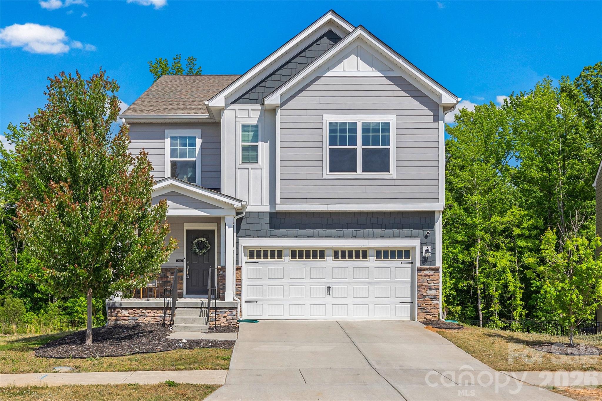 This is the one you've been waiting for - the first basement home EVER to come up for sale in Veronica Springs since builder completion. Welcome to 2742 Oldfield Drive, a 2022-built Lennar Frost plan that checks boxes most buyers don’t even think are possible in this neighborhood.  Let's start with what truly sets this home apart: this is the ONLY basement home currently available in Veronica Springs - and one of just FOUR ever built. Opportunities like this rarely come back around. Inside, the home delivers 5 bedrooms + large bonus room with flexible living options, a full guest suite on the main level with adjacent full bath - perfect for guests, multigenerational living, or a private office, a wide-open main floor with durable LVP flooring and seamless flow for everyday living and entertaining, and a chef-ready kitchen featuring a gas range, oversized island, and a walk-in pantry that actually lives up to the name. Upstairs you'll find 4 additional bedrooms plus a spacious bonus room with french doors (media room, playroom, or work-from home haven) and a primary suite with an ideal layout complete with TWO large walk-in closets and a well-appointed ensuite bath with large walk-in shower. Now let’s talk about the hidden value you won't want to miss… the 1105 sqft walk-out basement is fully wired, already plumbed for a bathroom, and ready for your vision. This is instant equity potential! Create a second living space, gym, theater, in-law suite, or income-producing setup.  Step outside and you'll appreciate the elevated deck off the main floor, providing shade to the full concrete patio below, a private, tree-lined backdrop with no neighbors ever to go behind you, and walk-out access that makes the basement actually usable and functional beyond just storage. Bottom line: You’re not just buying a house... you’re locking in one of the rarest opportunities in the entire community, with built-in upside most homes here simply cannot offer.