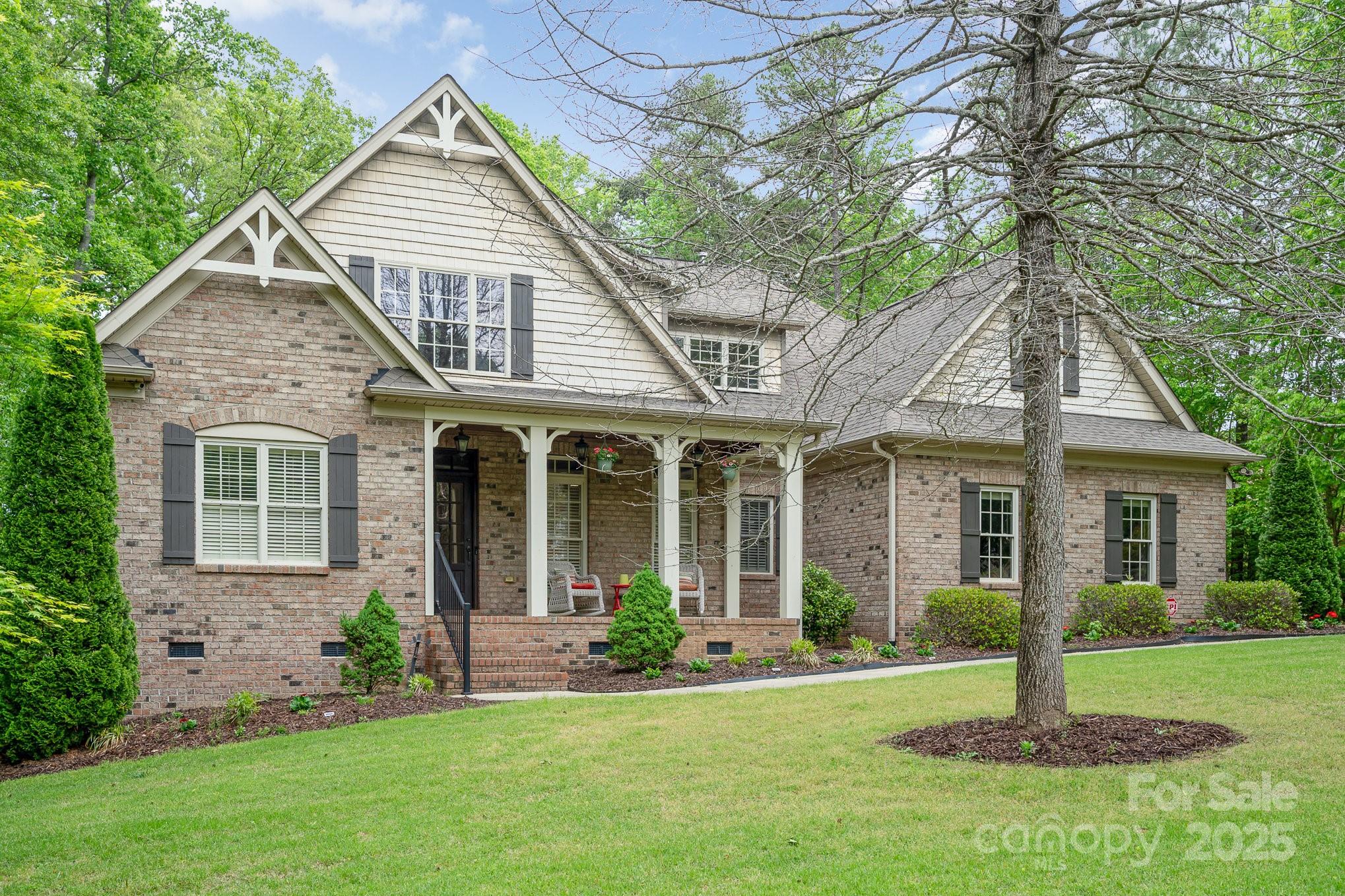 One acre lot with beautiful brick home!  Hardwood flooring, primary and guest br's on main, large primary bath with sep shower, lg tub.  Great room with vaulted ceilings, f/p lots of windows.  SS appliances, dbl oven, large island, quartz island, granite, formal dining, built-ins, study/office, huge bonus room, walk-in attic!  Large screened porch overlooking the beautiful heated saltwater pool with automatic cover and hot tub.  Two car garage plus 3rd bay for golf cart, tools etc.Irrigation, large driveway - privacy.  Near to downtown businesses and restaurants; easy access to FM Bypass, Indian Land business corridor, great Fort Mill Schools.