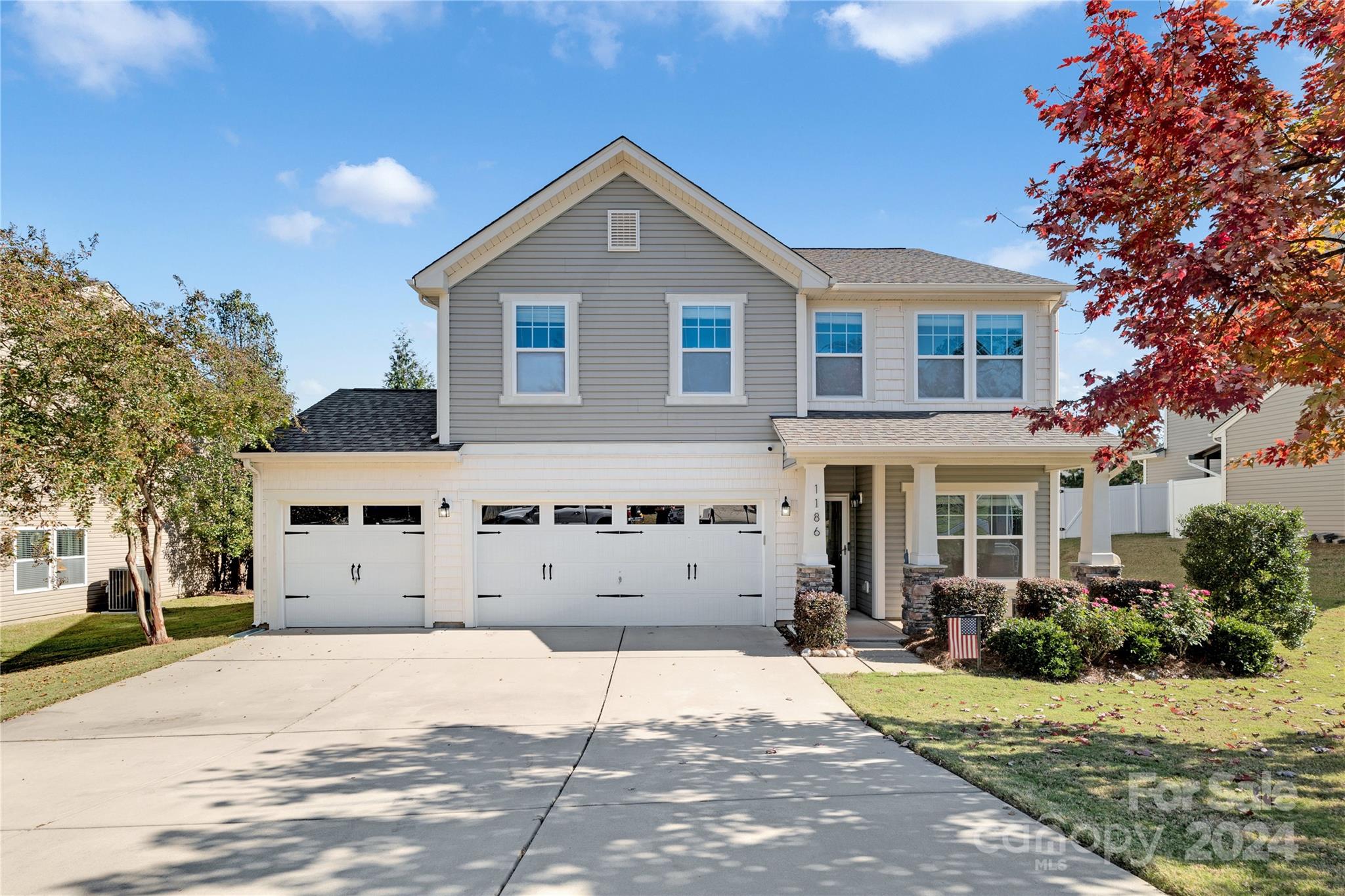 Welcome to 1186 Jasmine Drive, a captivating residence offering 2,598 square feet of living space. This home includes 3 bedrooms, 2.5 bathrooms, and a large upstairs loft. The kitchen is perfect for cooking and hosting, featuring an open layout and stainless steel appliances. The primary suite is a personal sanctuary, with a spacious design and a bathroom crafted for relaxation. Additional bedrooms are generously proportioned, with plush carpeting and abundant natural light, which is ideal for relaxation or a home office setup. Outside, enjoy the fenced backyard with a patio, perfect for leisure. The rare 3-car garage provides versatile options for parking, a workshop, or exercise space. Located in the vibrant Indian Land community and just minutes away from Ballantyne. Experience the convenience of nearby dining and shopping options, along with the charm of an area that is quickly becoming a sought-after destination!
