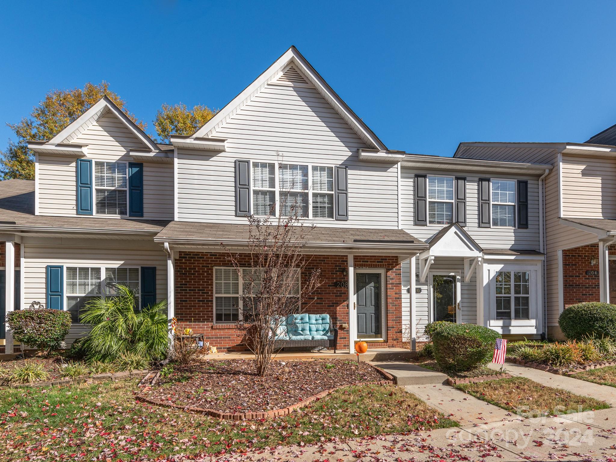 Beautifully bright & spacious townhome w/ family friendly community pool all located near top rated Fort Mill Schools! Home has been recently updated and includes vinyl plank flooring throughout main level creating a seamless transition throughout entire space. Large windows, bright walls & recessed lighting creates an extra open feel. Large living room has cozy fireplace adding a homey touch. Stunning kitchen has bright quartz counters, tons of grey cabinets + open wooden shelving for storage + white subway tile backsplash & matching S.S appliances. Dining area open to living area + Breakfast nook allow plenty of space for hosting family and friends. Upstairs find 2 large carpeted bedrooms w/ 2 full bathrooms, again updated for a modern and spacious feel. HOA includes water, sewage & trash + outdoor community pool. Home is located in an amazing neighborhood and just 2 miles to tons of shops & restaurants in Downton Fort Mill. Quick access to I-77 getting you to Charlotte or Columbia!