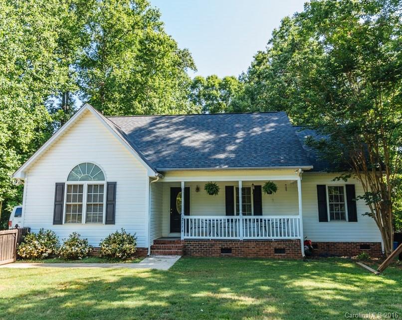 Gorgeous, inviting, front porch. Large flat private wooded lot. Entry way, Vaulted great room with Palladium window. large kitchen with generous size breakfast area, with door to deck. Large master down with walk in closet and master bath.  Upstairs has two additional bedrooms, Bonus area with Large walk in closet with in wall plumbing so bath could be added. Large shed in back for storage.