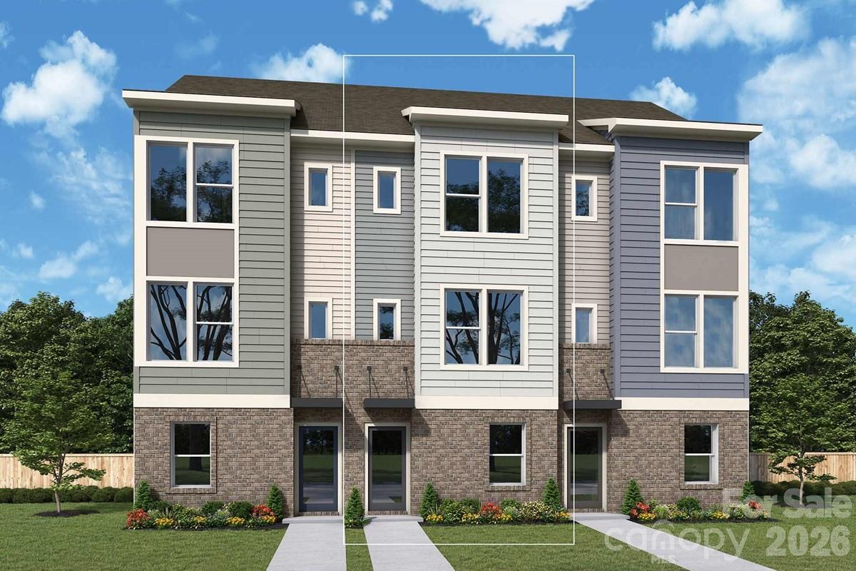 This thoughtfully designed David Weekley 2-bed, 2.5-bath floorplan offers modern comfort and thoughtful detail throughout. As an interior unit, it features a spacious balcony, 9-foot ceilings, and a 2-car tandem garage for added convenience. Enjoy energy-saving construction, Frigidaire Gallery appliances, Shaw LVP flooring, and a stylish kitchen island that anchors the open-concept living space. Perfectly crafted for both everyday living and effortless entertaining.