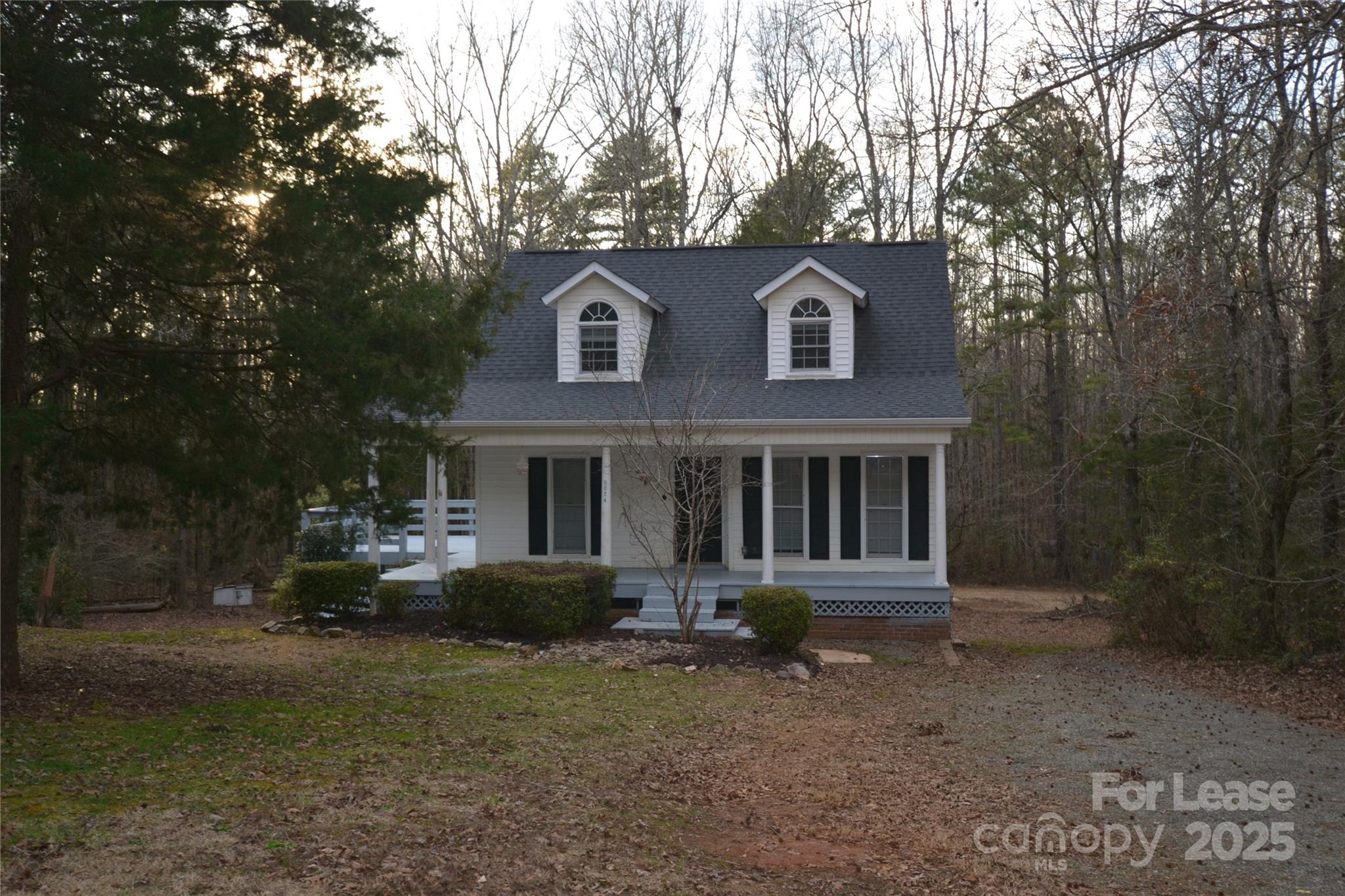 Enjoy the peaceful countryside in this well maintained Cape Code beauty with rocking chair front porch. Freshly painted throughout, new HVAC 2023. Just minutes to the city but miles from the city pace! Beautiful hardwoods throughout home. Kitchen has granite countertops with view into dining room. Bedroom and full bath on main level. 2 spacious bedrooms and full bath located on 2nd floor. Walkout basement with bonus room and shop. Large deck to enjoy the peacefulness of the mature trees surrounding the house on over 6 rolling private acres.