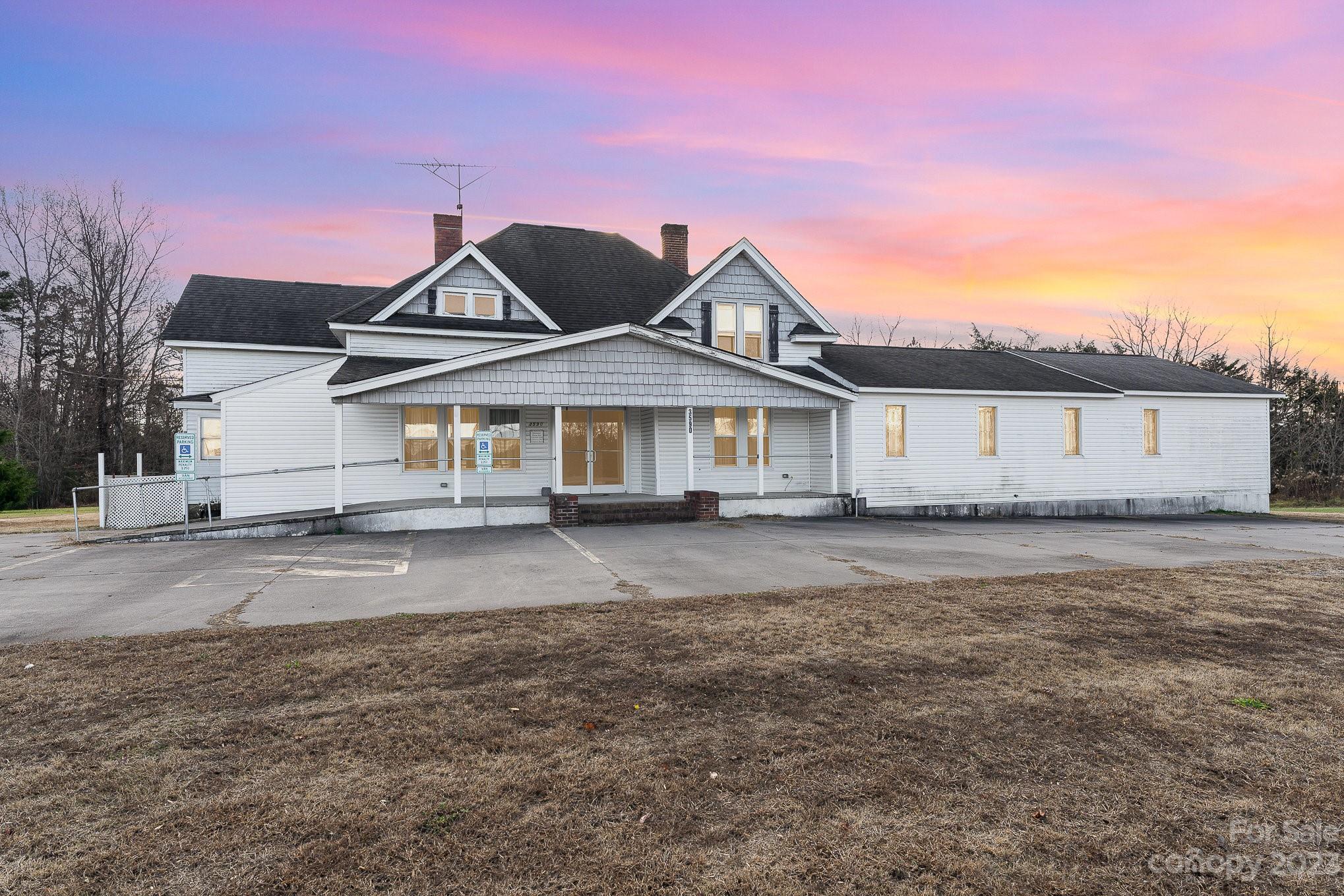 Welcome to East Bend, NC's exceptional opportunity! This multi-zoned 1.5+ acre property offers a 50x30 detached 2-car garage, The main level features 1 full & 3 half baths, dining, kitchen, living room,with wood burning fireplace and a proposed main level bedroom, Upstairs ceiling height under 7 feet and not included in sq ft but prior owners used as 3 bedrooms. East Bend, with its community spirit, sets the stage for diverse possibilities. This property, a versatile canvas, invites you to shape it into your dream residence or small business venture. Sold as is, will need repairs. See agent only. DOT has informed the seller that there are plans to "modernize roadway and intersection improvements on NC 67 from US 601 in Boonville to West Main St in East Bend" which could possibly impact the property in some way.