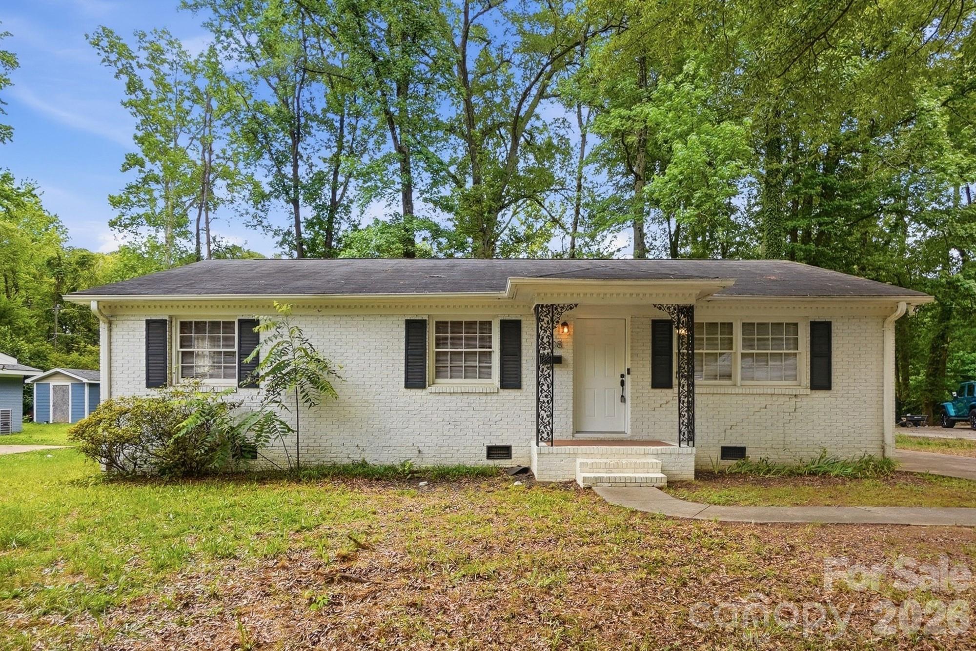 Welcome to 6308 Covecreek Drive, a charming brick ranch offering the perfect blend of character, comfort, and convenience in a sought-after Charlotte location. This beautifully refreshed 3-bedroom, 2-bath home features a spacious and versatile floor plan, including a flex room currently staged as a home office—ideal for remote work, hobbies, or additional living space.
Inside, you'll find refinished hardwood floors that add timeless appeal, complemented by vinyl flooring and fresh paint in tasteful, modern colors throughout. The kitchen offers abundant cabinet and counter space, a convenient breakfast bar, and plenty of room for gathering with family and friends.
The home's functional layout is enhanced by ceramic tile and carrera marble bathrooms, generous living areas, and an abundance of natural light. Both bathrooms were renovated to the studs with new subfloor 5 years ago. Brand new HVAC installed in 2022. Outside, enjoy a large backyard with endless possibilities for gardening, recreation, or entertaining. A detached 2 story garage workshop provides valuable storage and workspace for DIY projects, hobbies, or equipment.
Conveniently located near Central Avenue with easy access to Uptown Charlotte, I-85, and I-77, this home offers a quick commute to shopping, dining, entertainment, and Charlotte Douglas International Airport.
