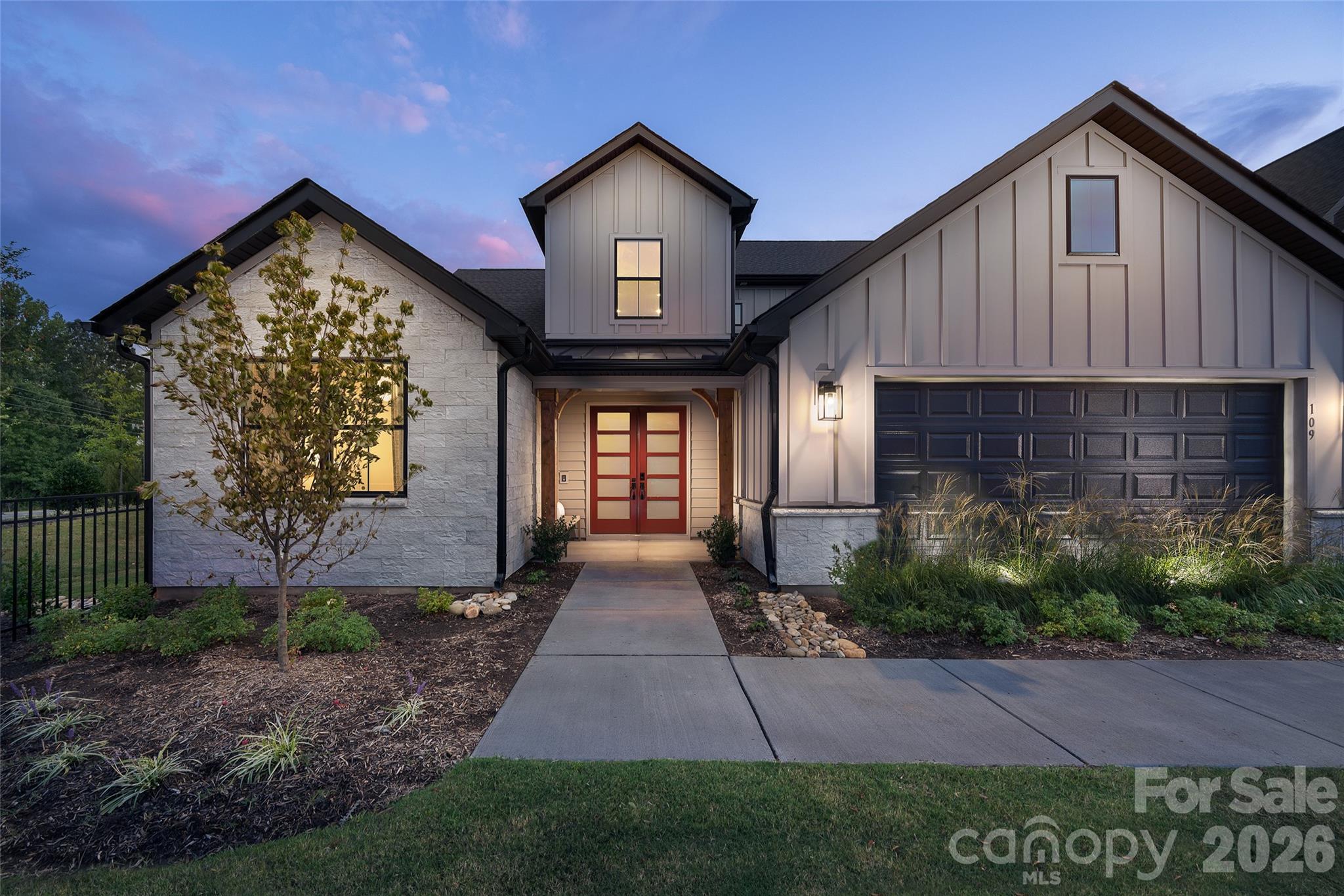 Own the Award-Winning Willow Model Home—A MAME Award Winner for Best Architecture and one of Windell Woods’ most popular floorplans! This professionally designed model home showcases the very best in luxury living, with exceptional upgrades and designer finishes throughout. Thoughtfully appointed with a media room, home gym, bonus room with private deck access, bay window in the primary suite, and an impressive double-door front entry, every detail was selected to inspire. The showstopping kitchen features Lexington Whisper cabinetry with stacked glass-front cabinets, quartz countertops with a dramatic waterfall edge, designer tile backsplash, under-cabinet lighting, premium appliances, and a wet bar with beverage center. A rolling wall of glass seamlessly connects the dining area to an outdoor oasis complete with a covered patio, gas fireplace, outdoor kitchen with gas grill, extended patio, and custom seating wall surrounded by professional landscaping. Inside, enjoy elite-level trim and doors, a striking electric fireplace in the great room, a spa-inspired primary bath, designer lighting and ceiling fans, plus the convenience of an included washer, dryer, and refrigerator. This is a rare opportunity to purchase the Willow model home and own one of the most celebrated residences in Windell Woods—schedule your private tour today before this showcase home is gone!