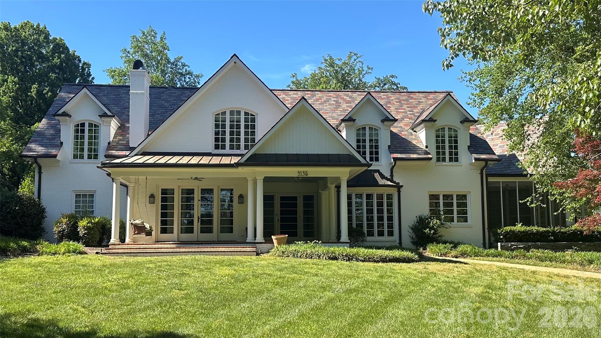 Welcome to 3135 Loma Lane—an extraordinary estate opportunity tucked away on a private cul-de-sac in one of Charlotte’s most coveted and established enclaves, just moments from Charlotte Country Club and minutes to Uptown.

Set on an expansive 0.76-acre lot, this stately residence offers just under 6,900 square feet, 6 bedrooms, and 6.5 bathrooms in the main home, and an additional 690 square foot detached living quarter—providing a rare combination of scale, privacy, and location that is increasingly difficult to find in Charlotte’s in-town market.

Originally constructed with enduring quality and thoughtfully expanded with a second-story addition, the home blends classic architecture with generous living spaces designed for both everyday comfort and large-scale entertaining. From the moment you enter, you’re met with an abundance of natural light, multiple gathering areas, and a flowing layout that invites connection.

Outdoors, the property transforms into a true retreat—featuring a resort-style pool, mature landscaping, and a detached garage apartment with kitchenette and full bath, ideal for guests, extended stays, or private workspace. 

The home is also equipped with a whole home generator. No matter what Mother Nature throws your way, the lights will be on.

Whether enjoyed in its current form or reimagined to reflect a buyer’s personal vision, this home presents a rare opportunity to own a legacy property in one of Charlotte’s most sought-after locations.

All furniture, equipment, and appliances to be included with the home.