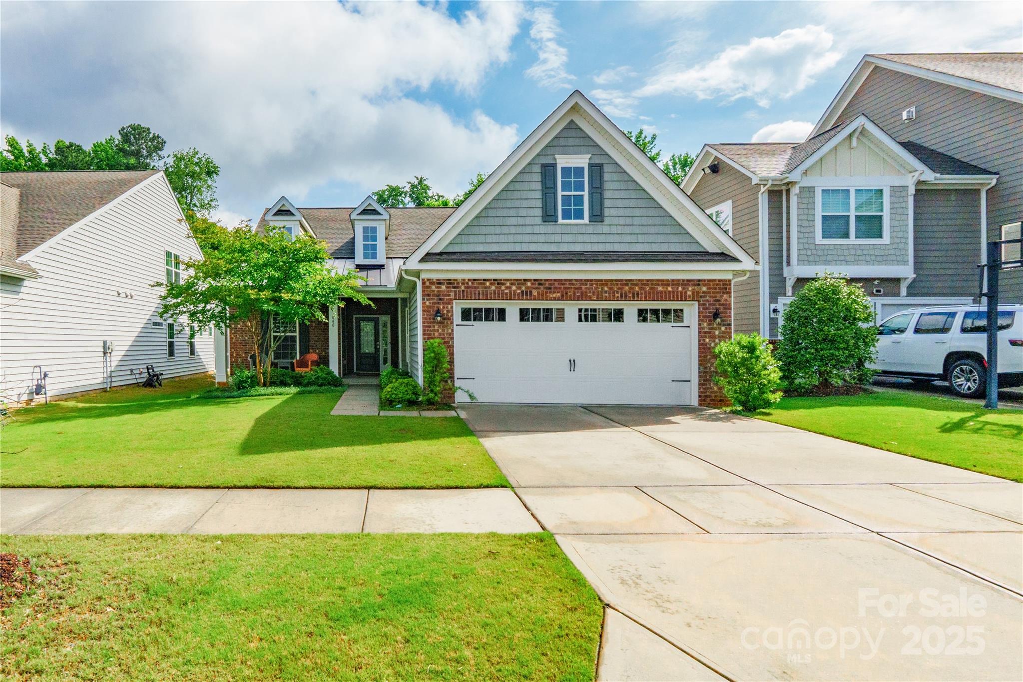 This well-kept cottage-style home offers 2 bedrooms, 2 bathrooms, and a separate office with glass French doors. It has beautiful hardwood floors, a roomy entryway, and tall ceilings throughout. The eat-in kitchen features granite countertops, and the crown molding and chair rails add a nice touch of detail. The primary bedroom includes a huge walk-in closet, and there’s a cute front sitting porch as well as a screened-in back porch that opens to a private yard. With a 2-car garage and everything in great shape, this home is ready to move into and enjoy.