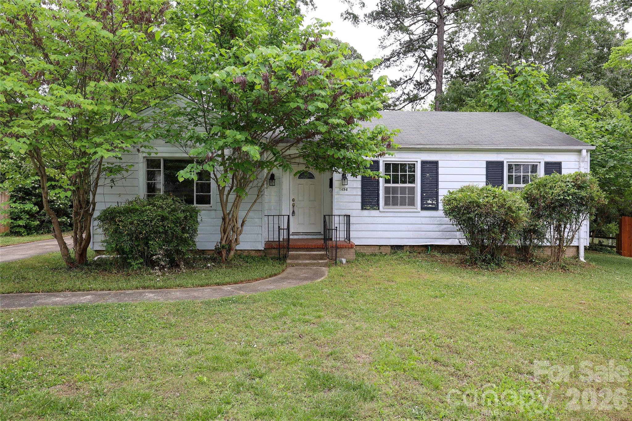 ATTENTION BUILDERS, INVESTORS, PROPERTY DREAMERS! Here is your chance to acquire one of last remaining PRIME lots in HOT Commonwealth Park w/ OVER HALF-ACRE of land! Without the heavy price tag and only a stones' throw to Plaza-Midwood, this 1948-built classic & timeless 3-BEDROOM RANCH home is ready for your vision and creative minds! The possibilities are endless with this WIDE, DEEP, and LEVEL lot w/ mature trees, offering the perfect serenity and privacy w/ NO HOA. The house offers excellent bones ready for your customization including beautiful hardwood floors, an updated kitchen and bathroom, and sound mechanicals- HVAC & gas tankless water heater (2019): it just needs a vision w/ mainly exterior and some interior TLC for it to become your dream home! Custom homes have recently been built nearby w/ tremendous growth taking place in this immediate area. Just blocks away, you are immersed with modern & eclectic conveniences, including grocers, coffee shops, arts & music entertainment, casual & fine dining options, Commonwealth/Midwood hot spots, & local shops. If that's not enough, take a 5-minute drive to Uptown and experience the finest culinary tastes Charlotte offers, attend year-round cultural arts & theater events, or attend a game and cheer for your favorite professional sports team. This is one prime location you won't want to miss, as it is right within all of the action & vibrant atmosphere to what makes Commonwealth/Midwood truly one of the most sought-after destinations in Charlotte! Don't miss this opportunity to be a part of Charlotte's future. House and property to convey AS-IS, WHERE-IS- value is in land.