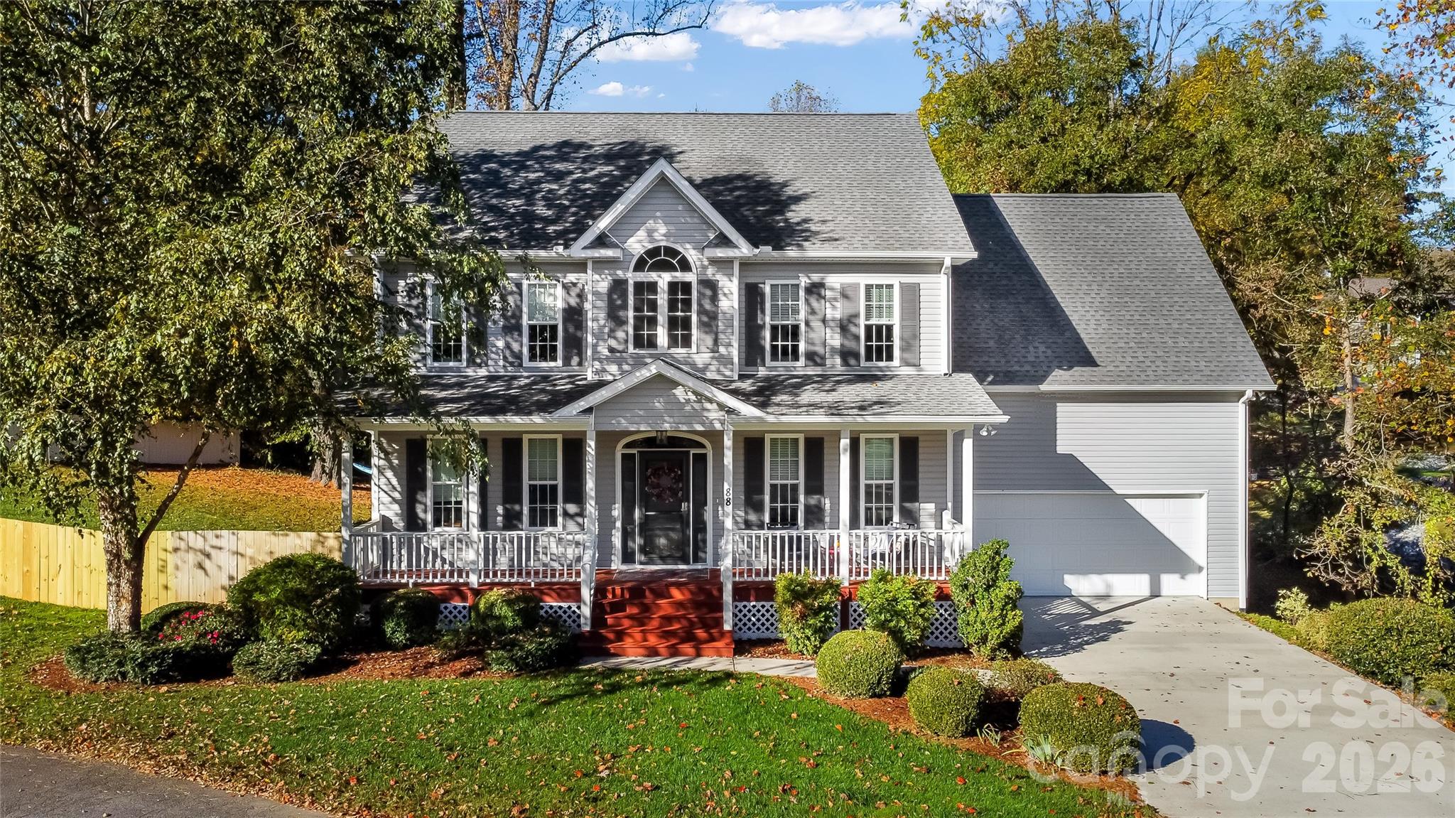 This truly lovely home sits in the beautiful and quiet Applewood Hollow community, just five minutes from downtown Hendersonville. You will absolutely love the idyllic setting complete with a small pond and dock to enjoy watching the wildlife. The .61 acre lot provides mostly level green space with a gentle slope in the back yard. Enjoy the covered front porch or the private back deck to start and end your day. Natural light and beautiful cherry wood flooring flows throughout the main level. The kitchen offers bar seating and an island to inspire your inner chef. Fantastic office or guest room on the main level includes built-in cabinetry and shelving. The natural gas fireplace keeps the living room and kitchen areas cozy while the breakfast nook is the perfect place to enjoy your morning coffee. This home provides so many extras: Partial home generator, bonus room, butlers pantry, and mature beautifully landscaped property.  No HOA. No damage from Hurricane Helene.