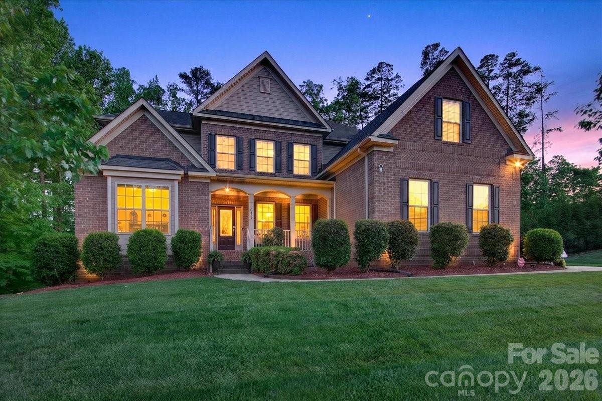 Welcome home to 9311 Scorpio Lane in the highly sought after Summerwood Neighborhood! Amazing all brick custom built home situated on a quiet and private cul-de-sac lot. This large premium lot is over half an acre with a large screened in porch perfect for morning coffee or evening drinks, and overlooking a large open back yard with new landscaping and mature wooded views. This home features a gracious floor plan with vaulted ceilings, 1st floor owner's suite, office with french doors, great room with coffered ceiling, large kitchen with SS appliances, double ovens, custom 43" cabinets, granite counters, butlers pantry, large breakfast room, laundry located on 1st floor, and gleaming hardwood flooring. Upstairs offers 4 bedrooms, huge bonus room with separate area for billiard table/ playroom/ entertainment area plus another bonus room which could be media/or 5th bedroom. Owner has done some major improvements, including fully encapsulating the crawl space, new interior paint, new backyard landscaping, new fully fenced back yard, landscape lighting and more! Summerwood amenities includes a pool, amenity area, stocked fishing pond, walking trails, soccer field and more! Welcome home!