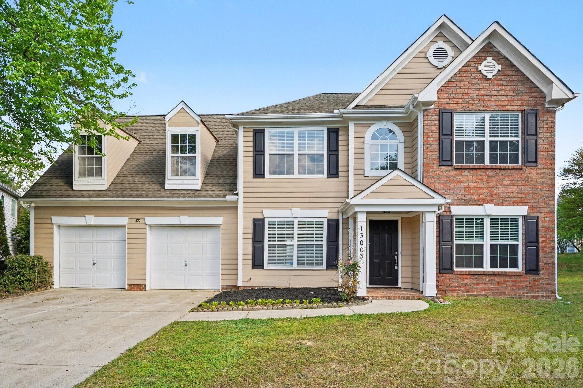 This 4-bedroom, 2.5-bathroom home offers a spacious and highly functional layout, perfectly finished with laminate flooring throughout the entire home. The main level is designed for both productivity and comfort, featuring a dedicated office, a formal living room anchored by a cozy fireplace, and a separate family room for casual gatherings. The heart of the home includes an eat-in kitchen space, ideal for morning coffee or informal meals. Outside, the small, low-maintenance backyard features a private patio, providing a perfect spot for outdoor dining without the burden of heavy yard work. Complete with an attached two-car garage, this home offers a versatile floor plan that balances work-from-home needs with classic living spaces.